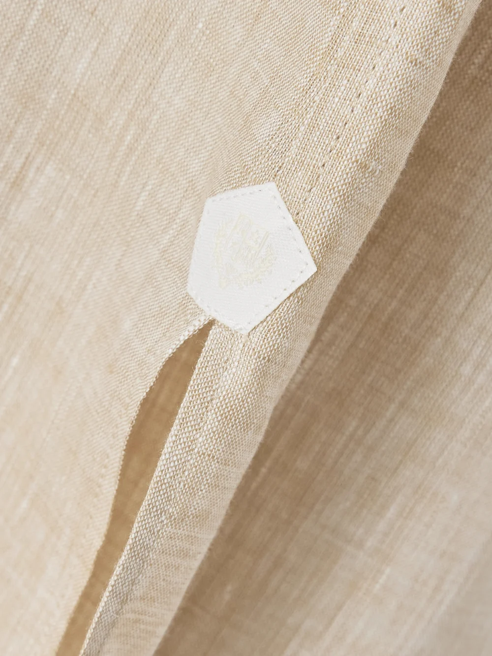 Close-up detail of the Loro Piana Lora Linen Midi Dress