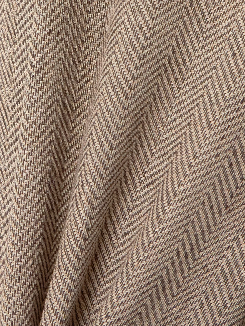 Close-up detail of the Loro Piana Nyack Pleated Herringbone Linen Wide-leg Pants