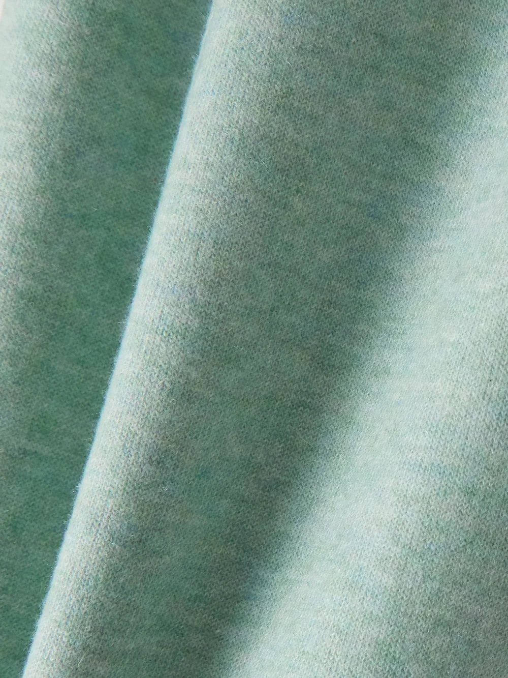 Close-up detail of the Loro Piana Pleated Tapered Cashmere-blend Pants