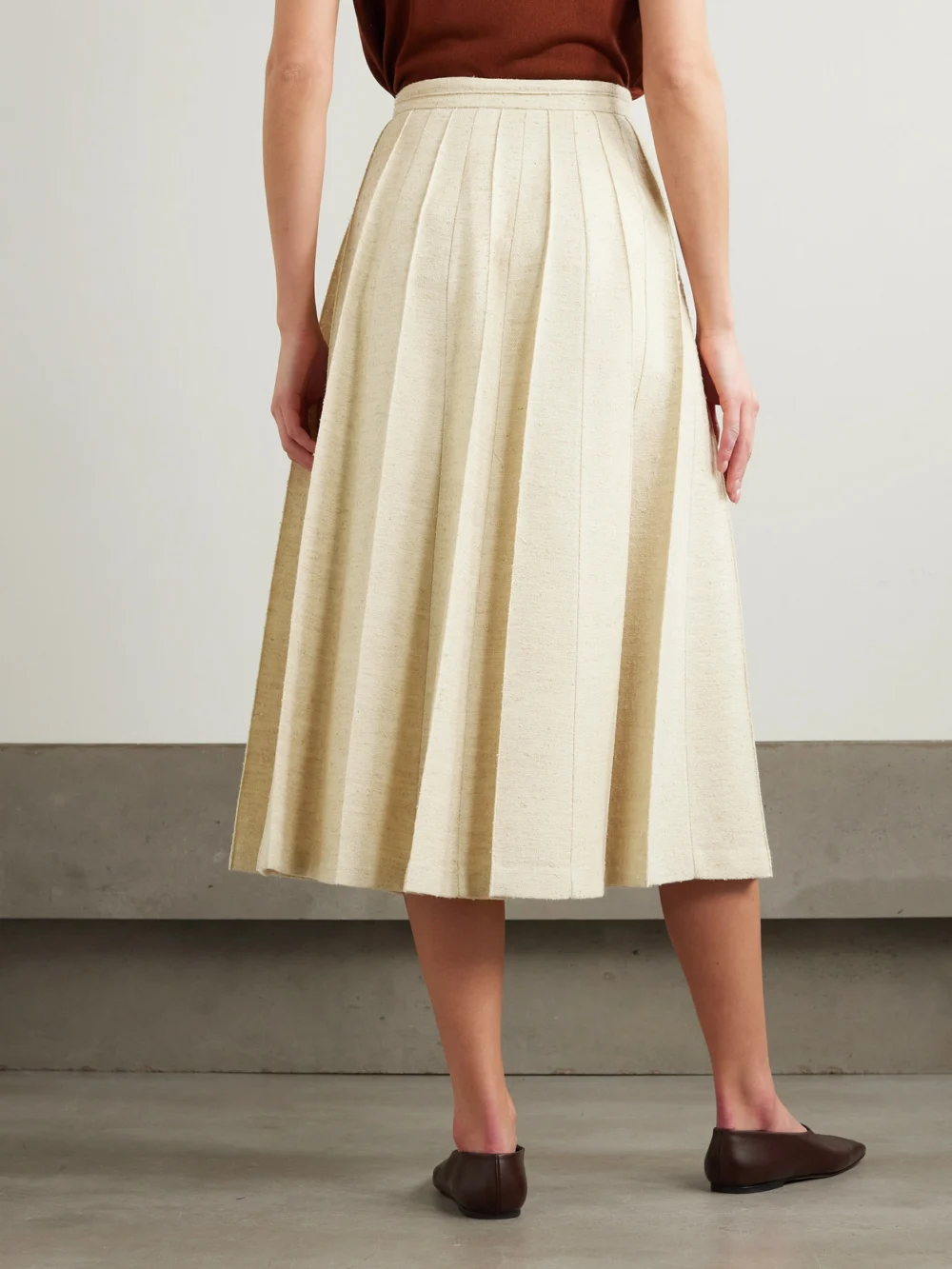 Back view of the Loro Piana Pleated Woven Midi Skirt
