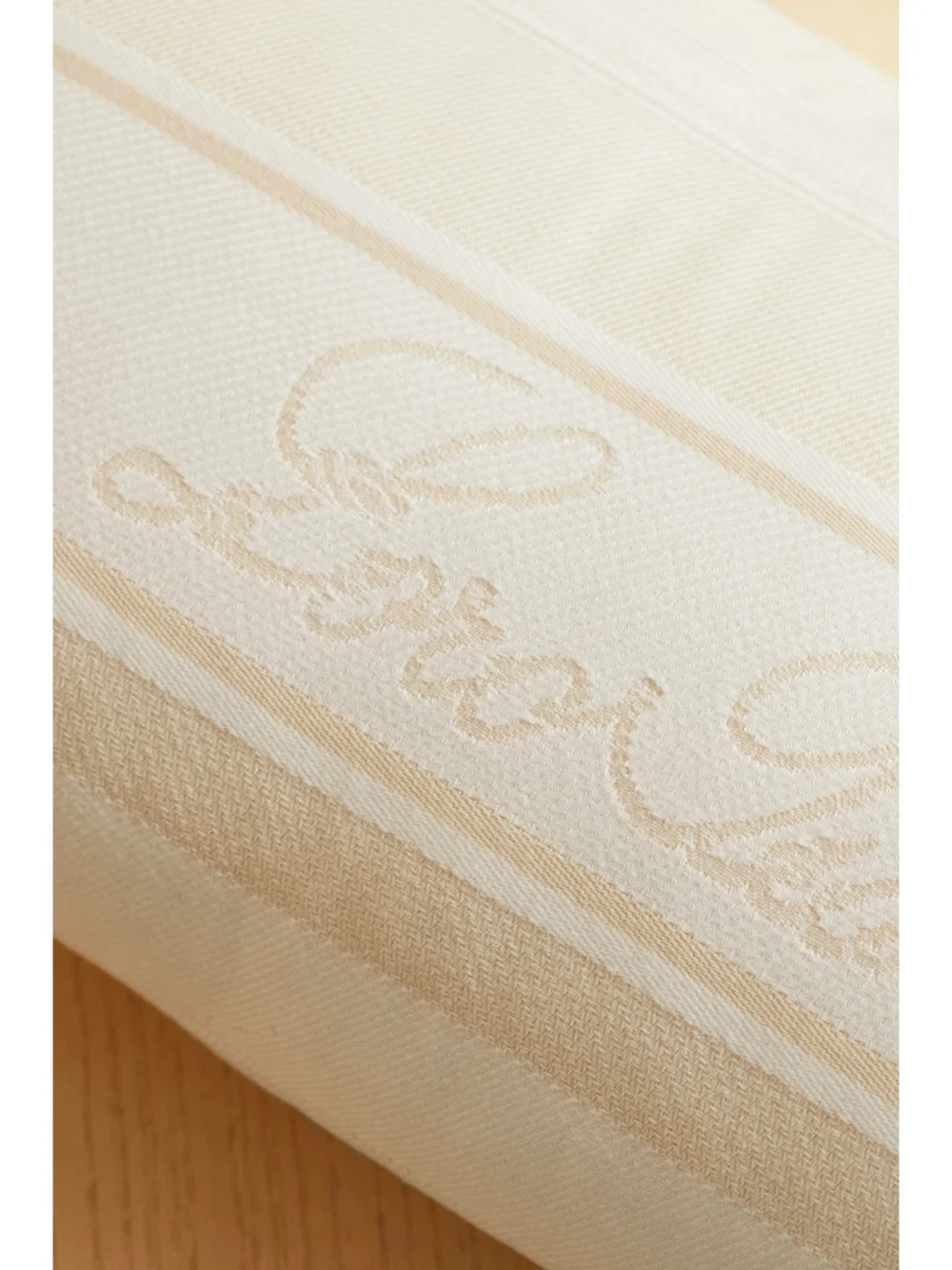 Close-up detail of the Loro Piana Portofino Cotton-jacquard Beach Pillow