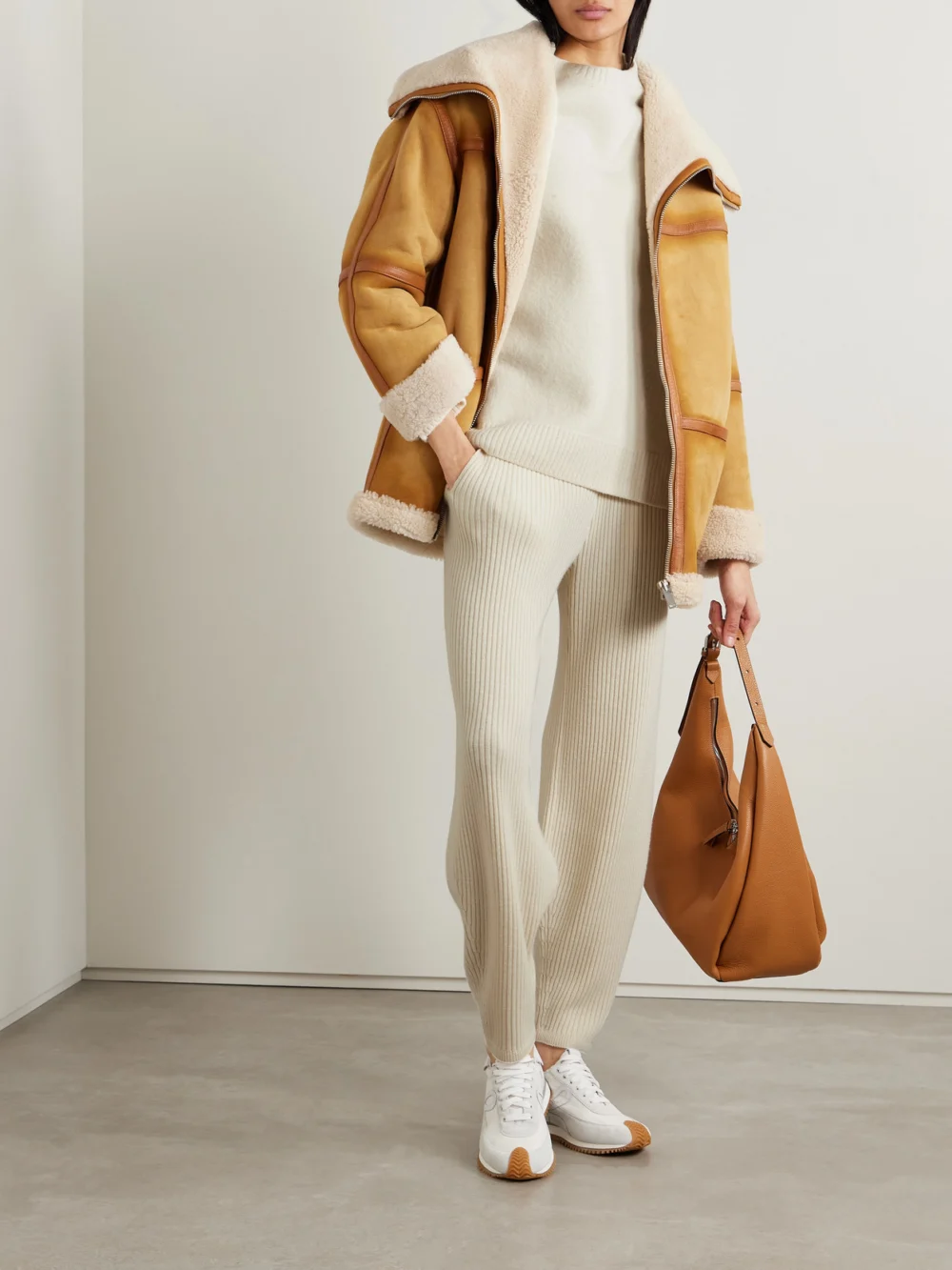 Loro Piana Ribbed Silk and Cashmere-blend Tapered Track Pants, worn by a model