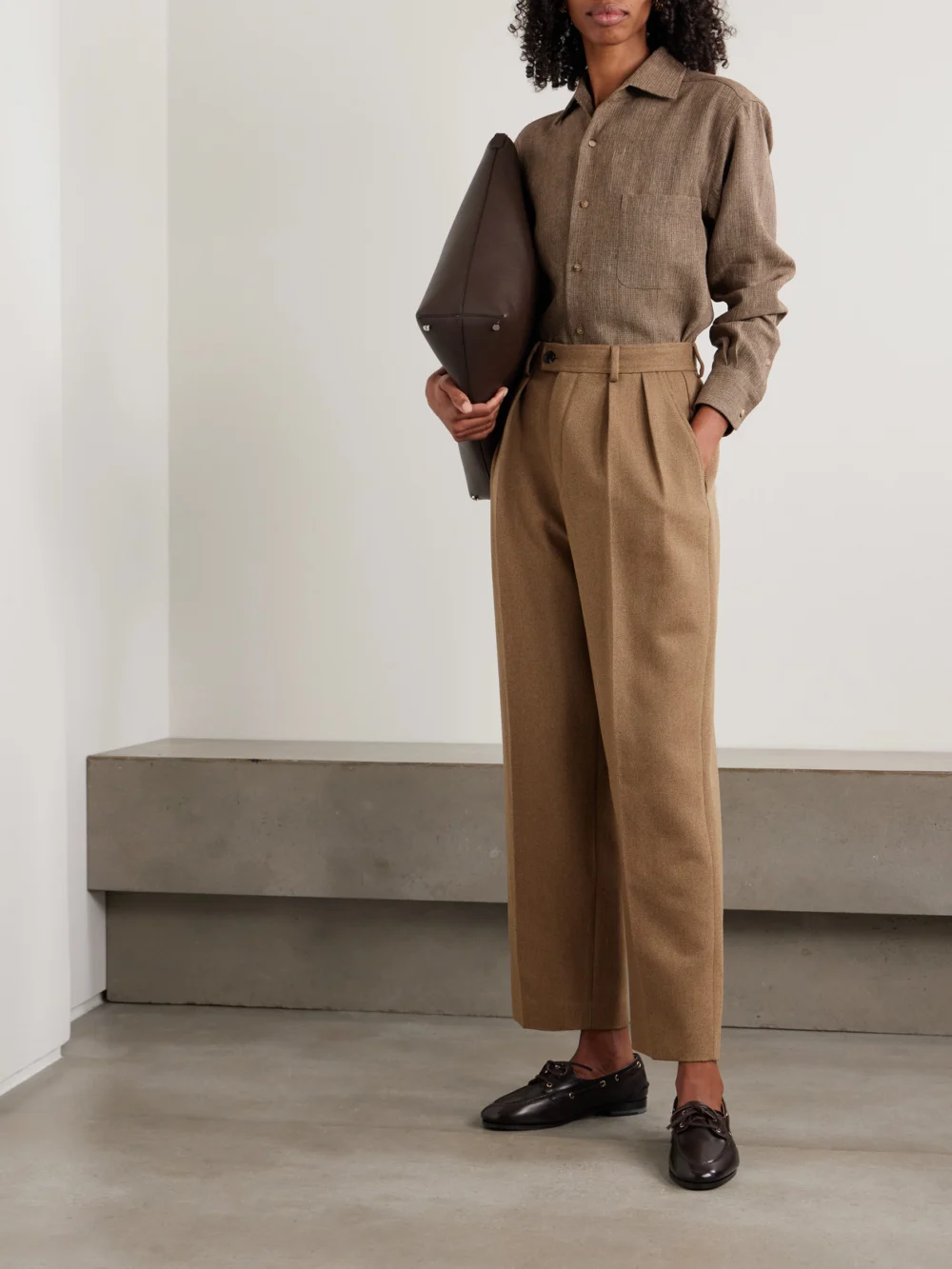 Loro Piana Rodger Pleated Rain System® Wool-twill Tapered Pants, worn by a model