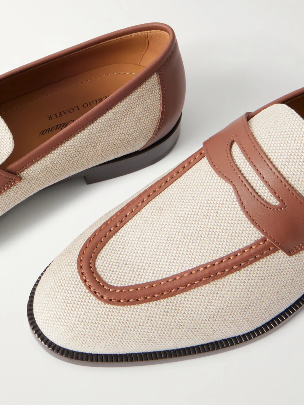 Close-up detail of the Loro Piana Sergio Leather-trimmed Canvas Loafers
