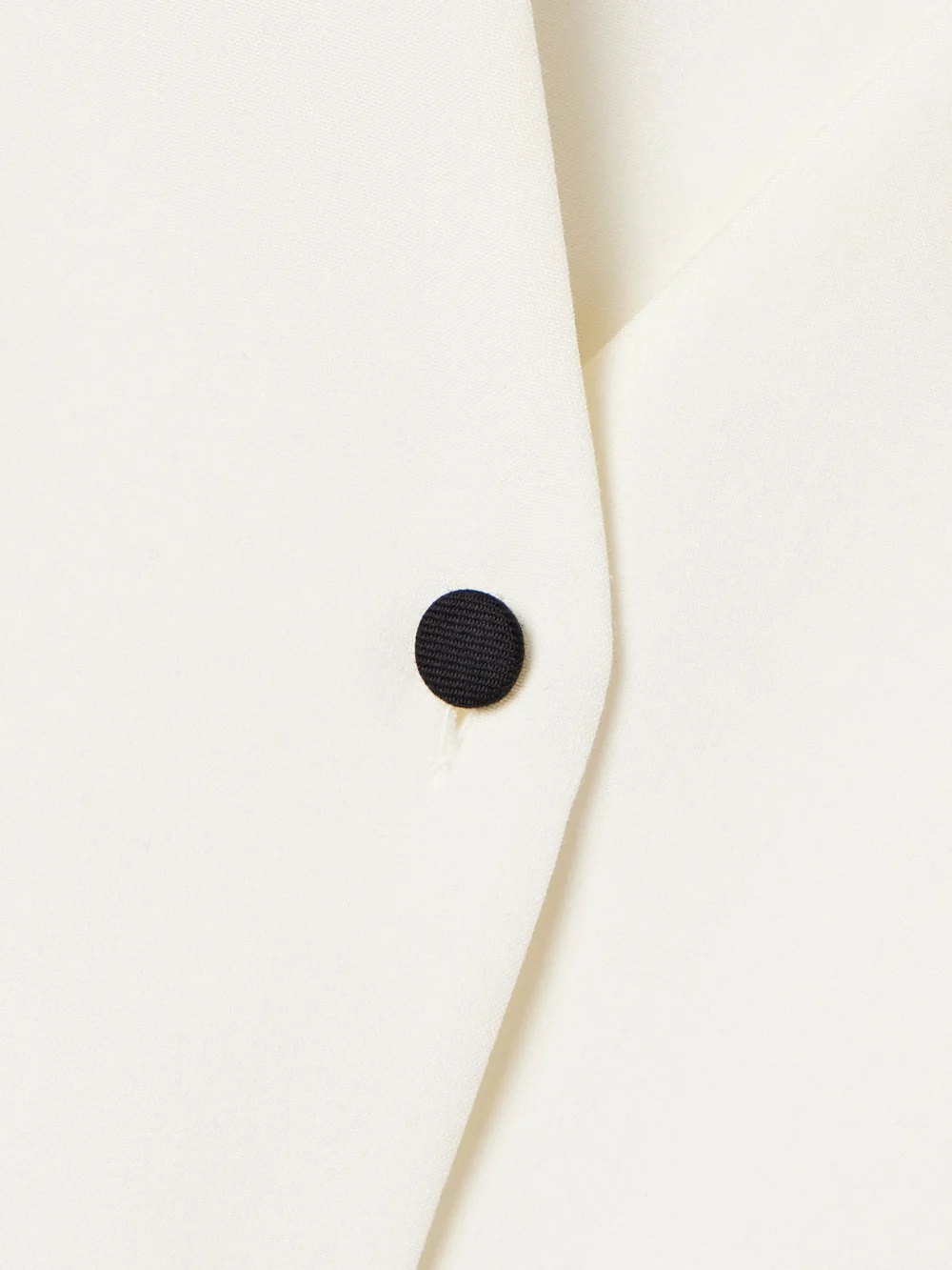 Close-up detail of the Loro Piana Silk Vest