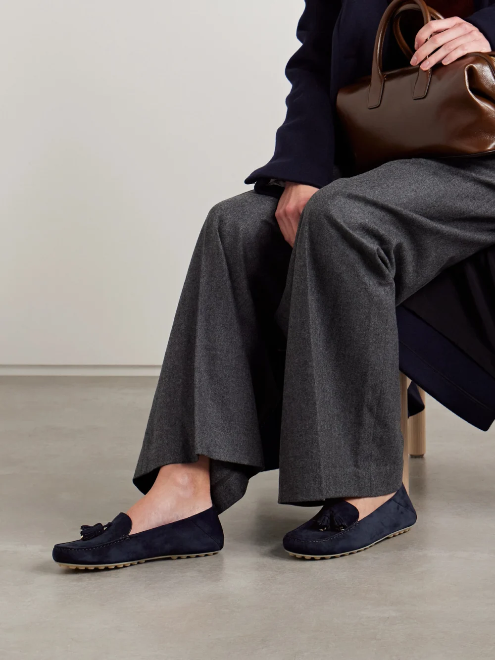 Side view of the Loro Piana Tasseled Suede Collapsible-heel Loafers