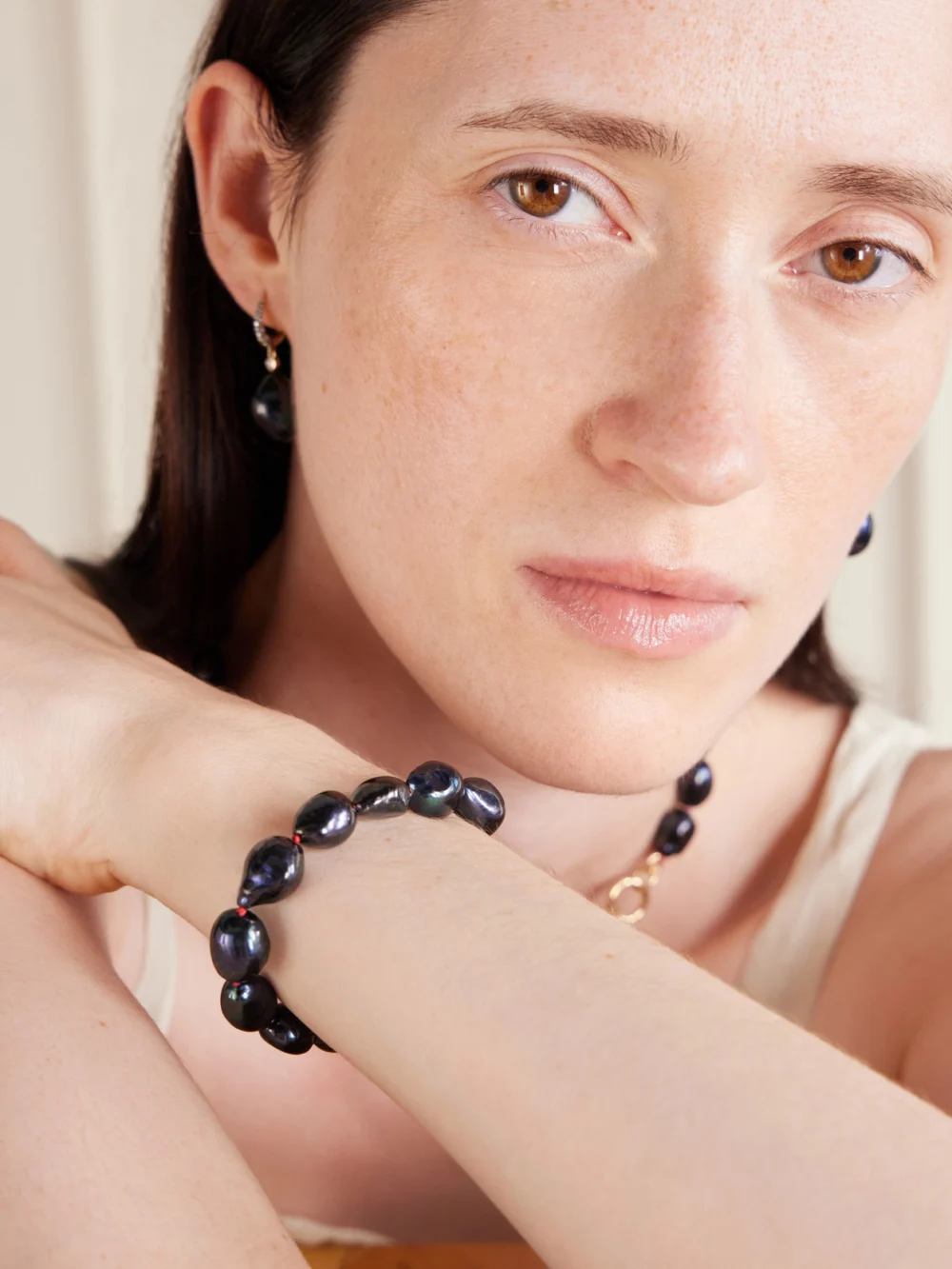 Lucy Delius 14-karat Gold, Diamonds and Pearl Bracelet, styled view