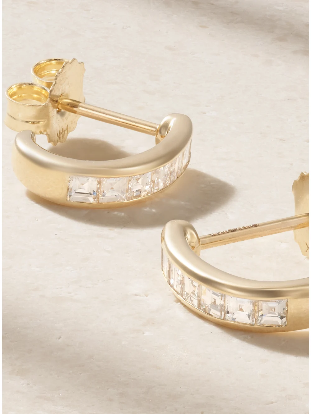 Close-up detail of the Lucy Delius Baby 14-karat Gold Diamond Hoop Earrings