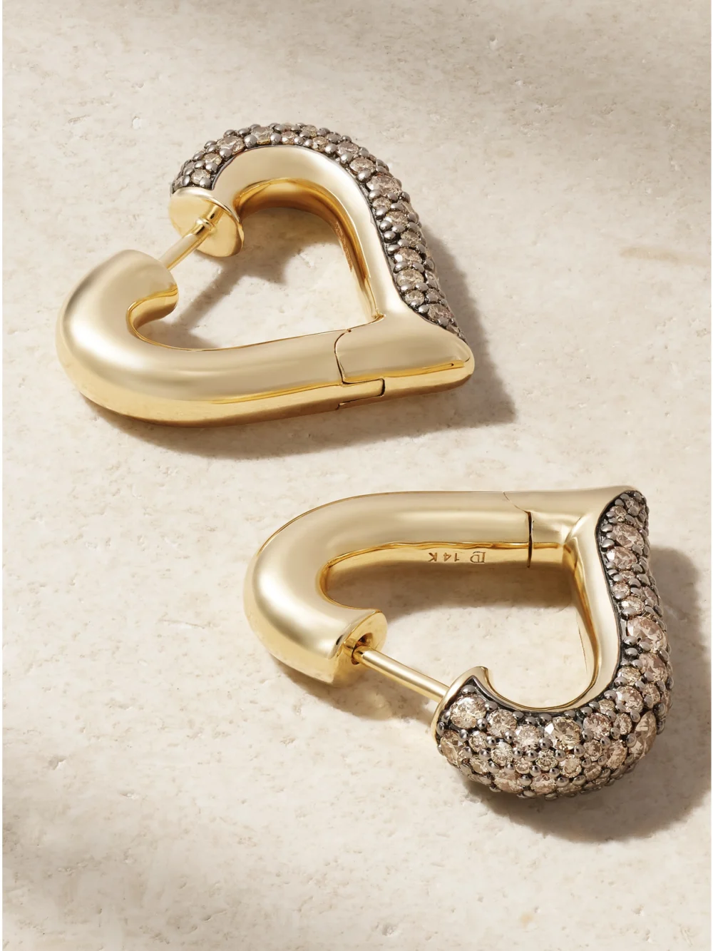 Close-up detail of the Lucy Delius Chubby Love Rhodium-plated Diamond Earrings