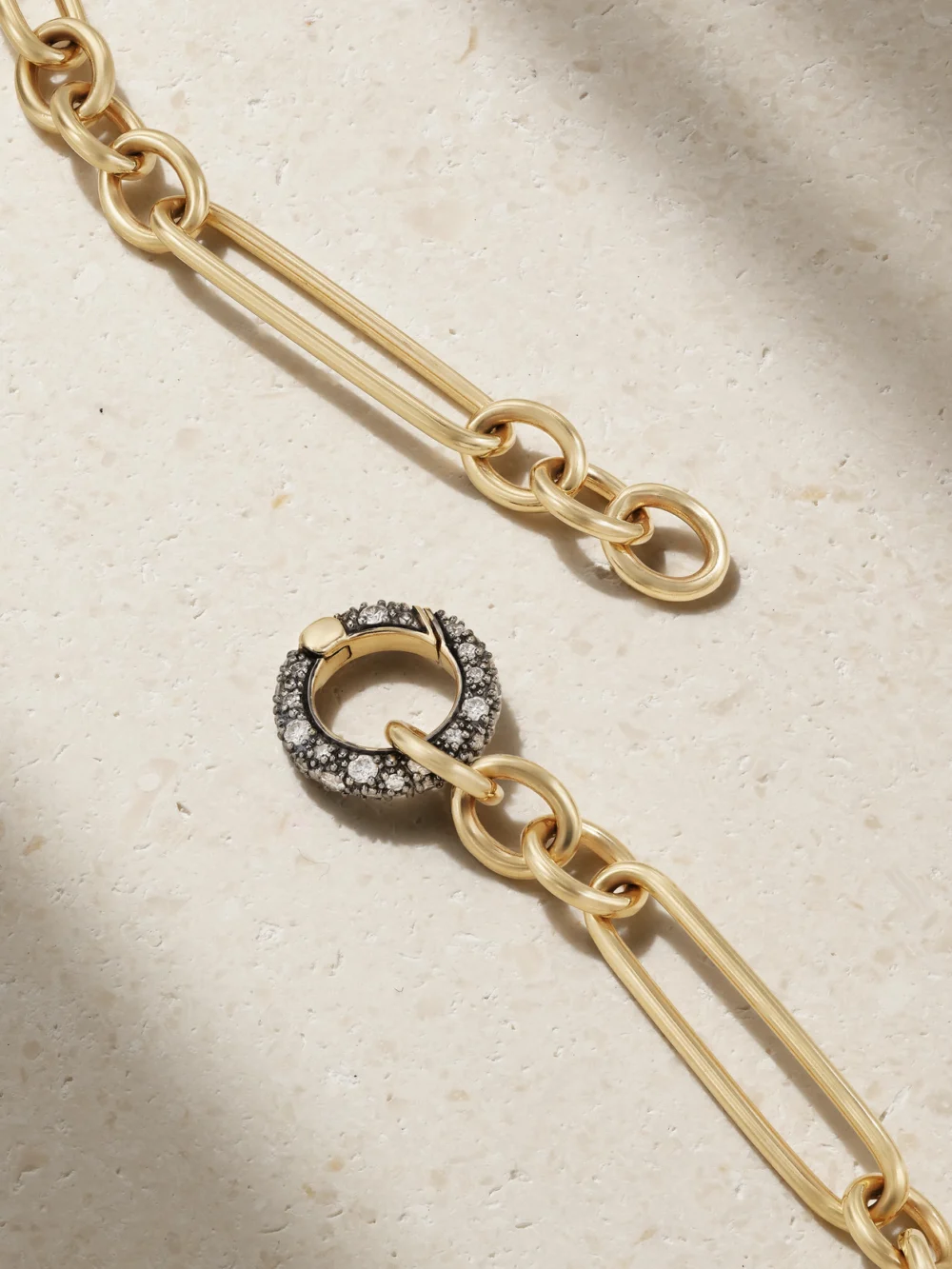 Close-up detail of the Lucy Delius Trombone Rhodium-plated 14-karat Recycled Gold Diamond Necklace