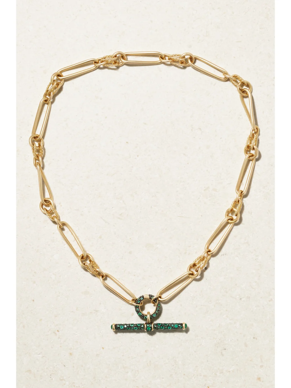 Close-up detail of the Lucy Delius Twisted Link Connection 14-karat Gold Emerald Necklace