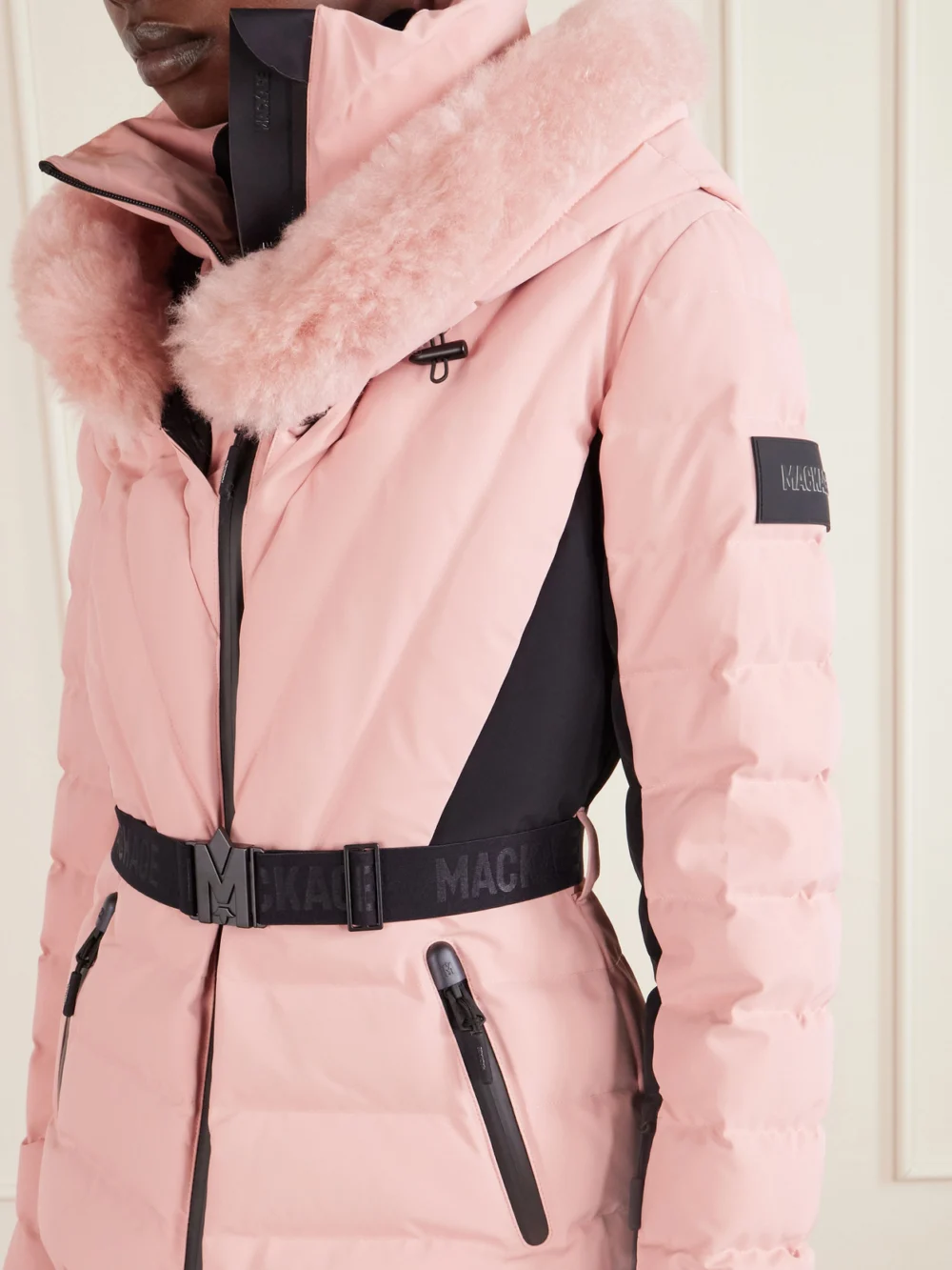 Close-up detail of the Mackage Elita Hooded Belted Quilted Down Ski Jacket