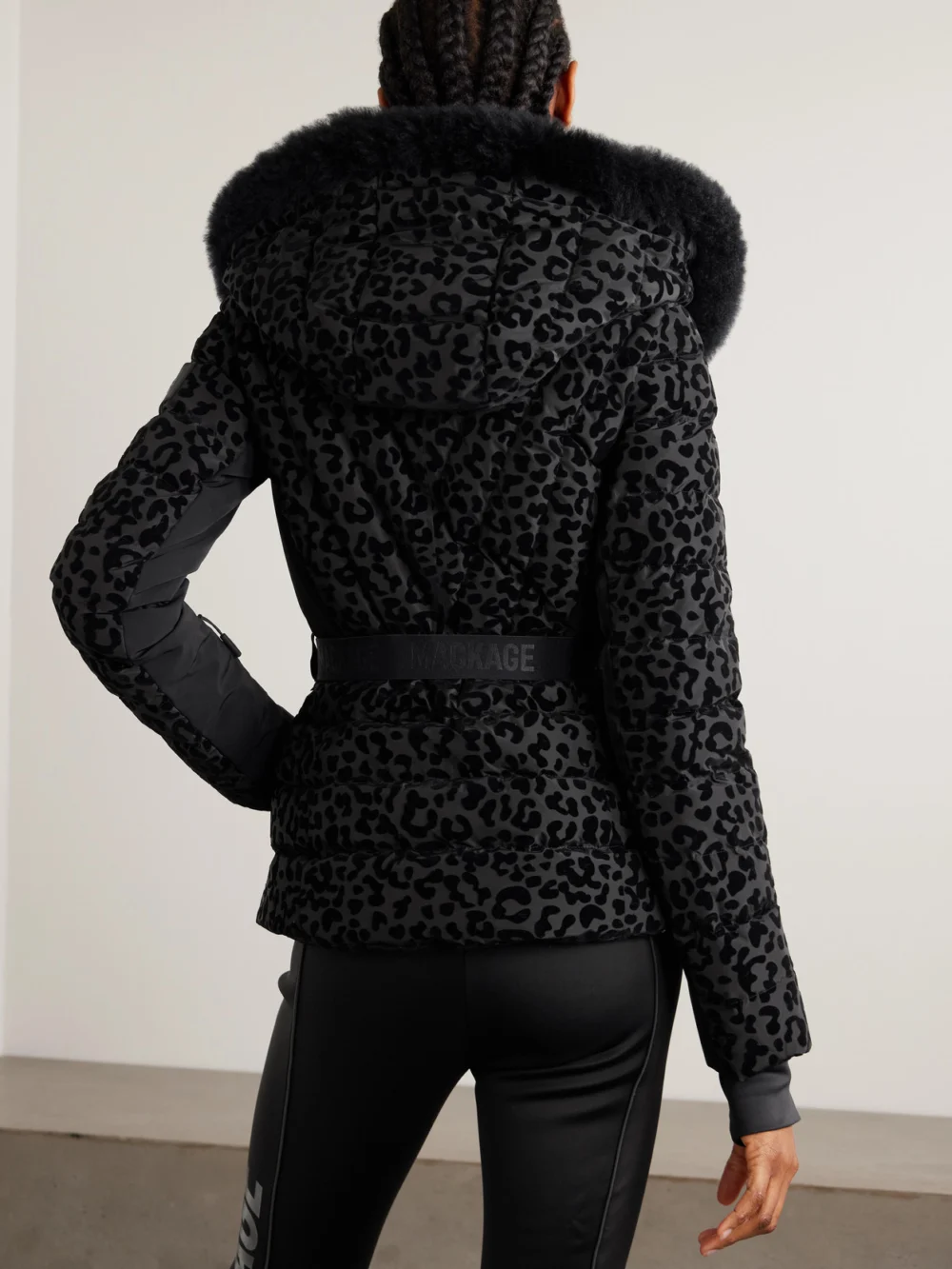 Back view of the Mackage Elita Hooded Belted Shearling-trimmed Flocked Down Ski Jacket