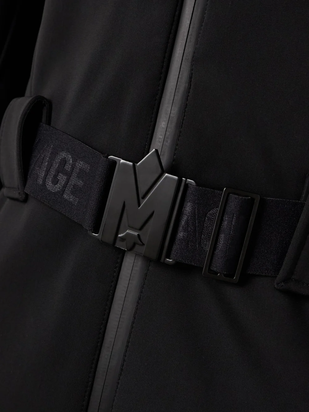 Close-up detail of the Mackage Elle Hooded Belted Shearling-trimmed Padded Ski Suit