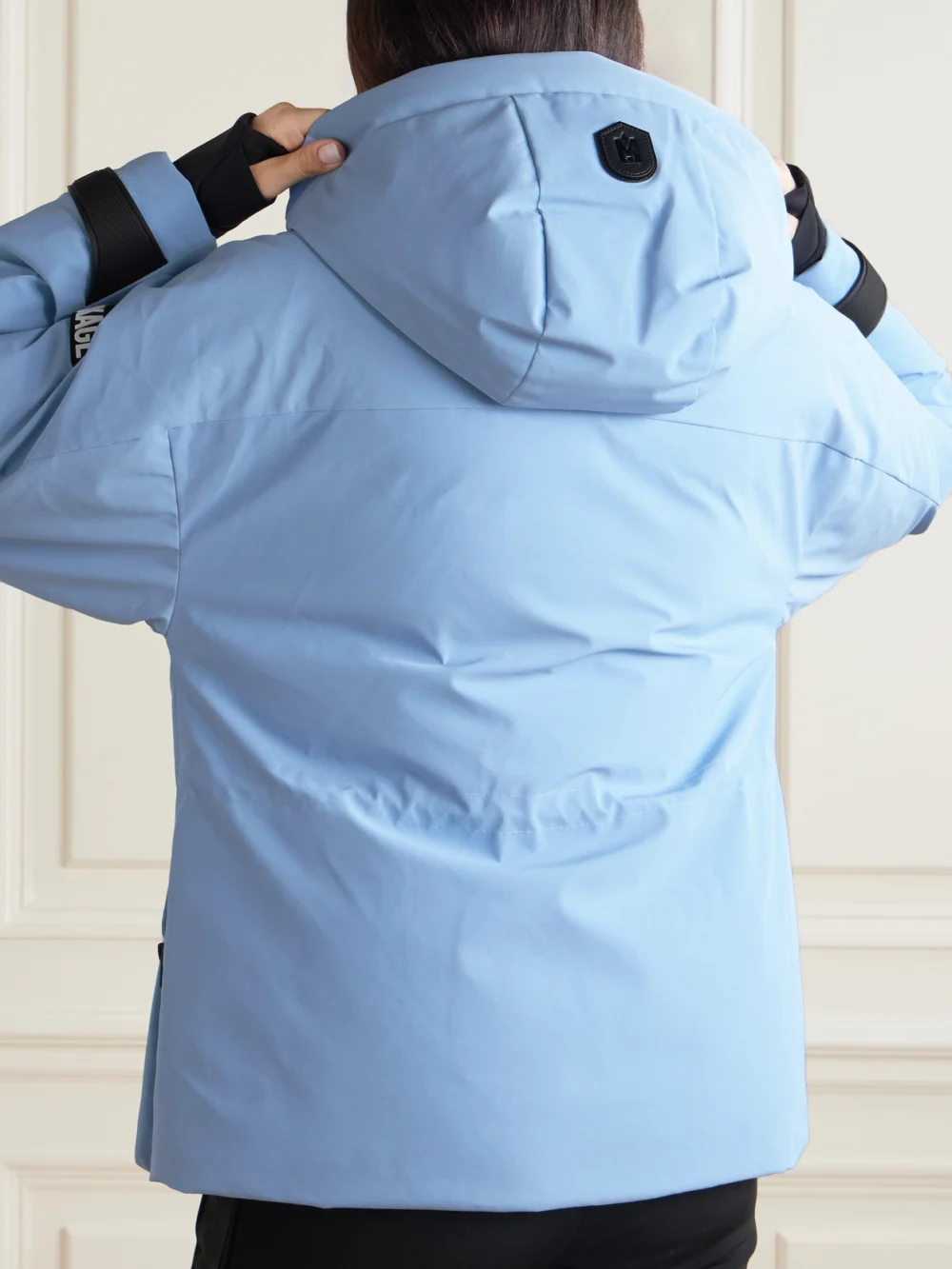 Back view of the Mackage Iclyn-r Hooded Appliquéd Down Ski Jacket