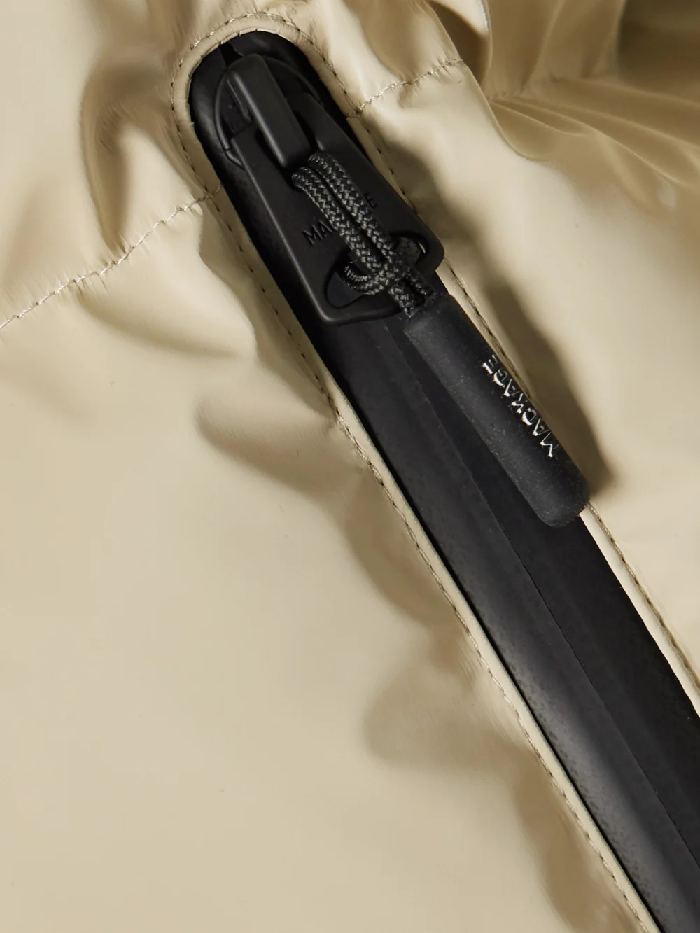 Close-up detail of the Mackage Kairi Hooded Cropped Quilted Down Ski Jacket