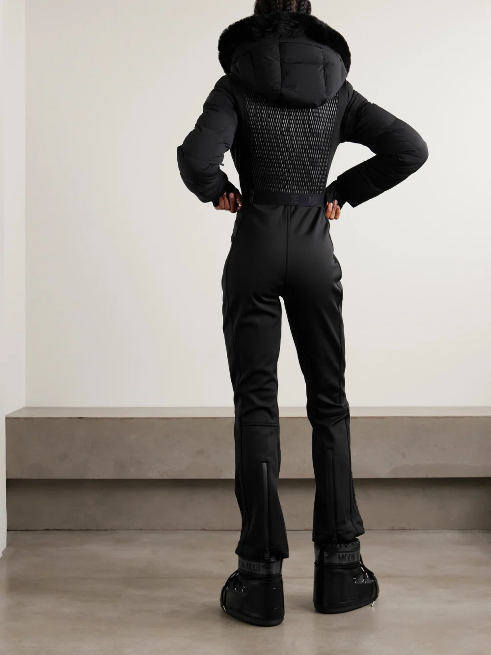 Back view of the Mackage Lorelle Belted Hooded Plush-trimmed Quilted Padded Down Ski Suit