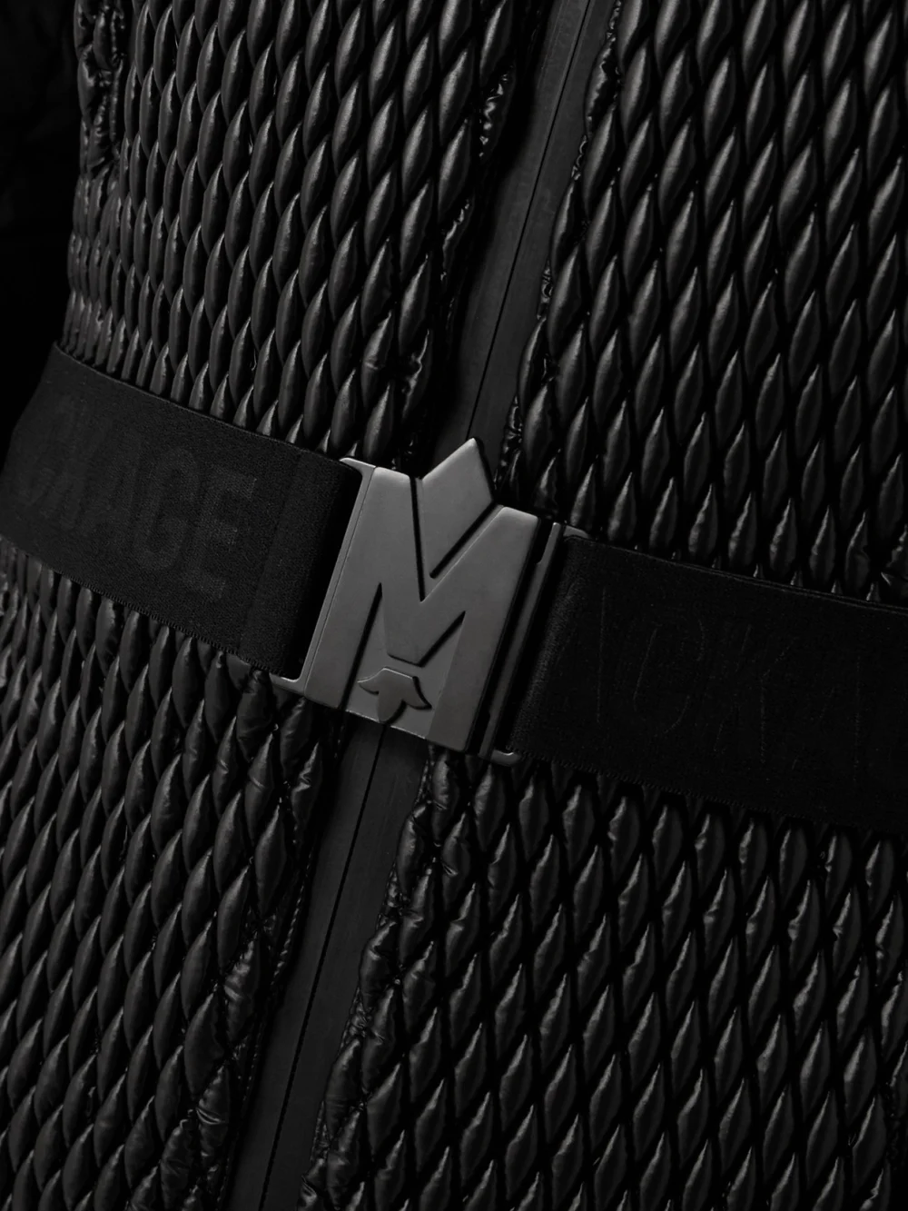 Close-up detail of the Mackage Lorelle Belted Hooded Plush-trimmed Quilted Padded Down Ski Suit