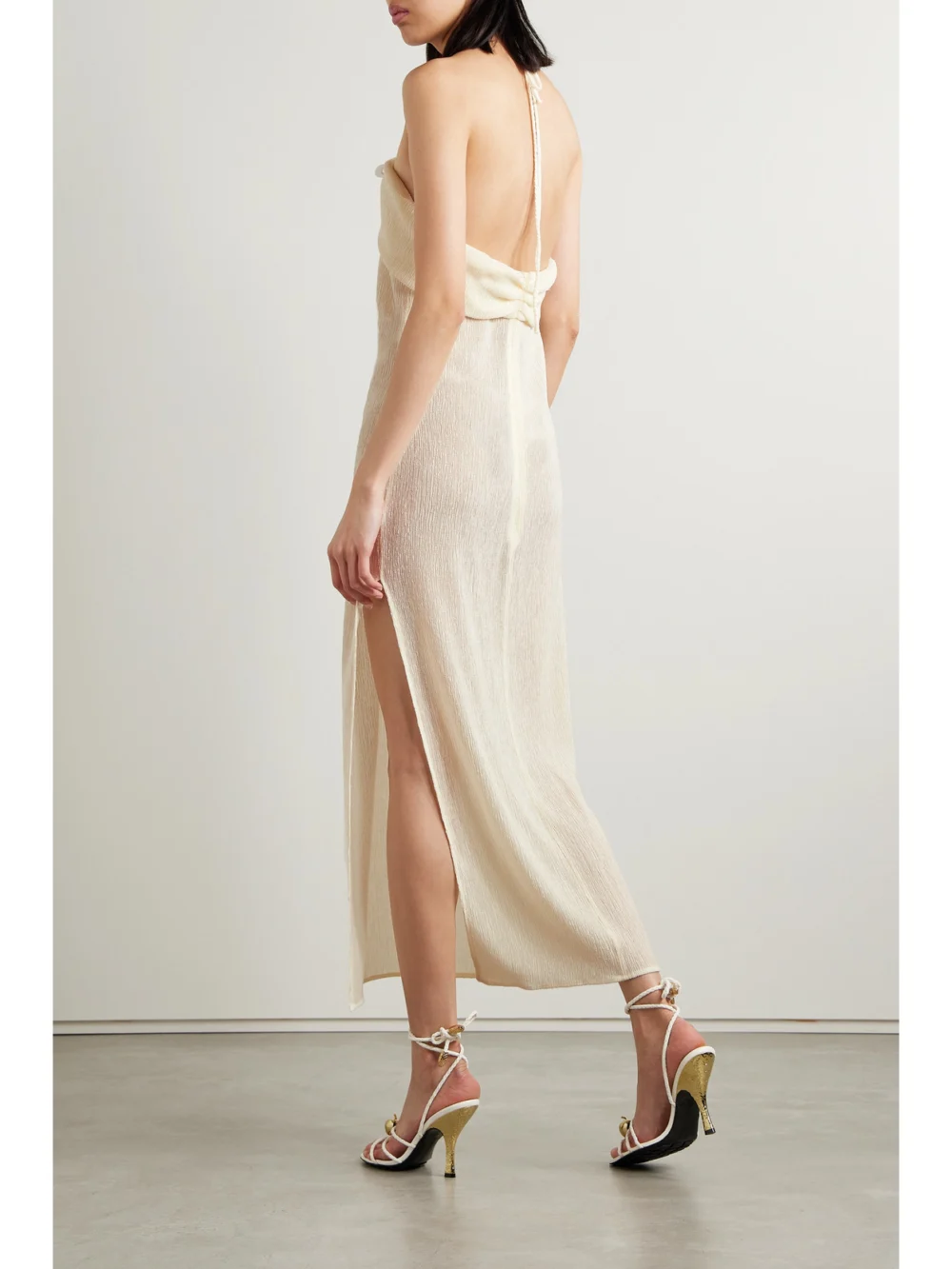 Back view of the Magda Butrym Embellished Gathered Stretch Lyocell-blend Halterneck Maxi Dress