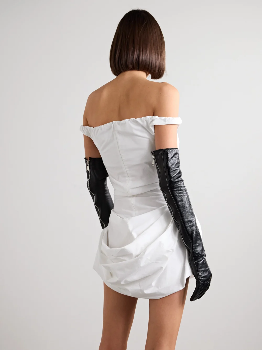 Back view of the Magda Butrym Off-the-shoulder Draped Cotton-poplin Mini Dress