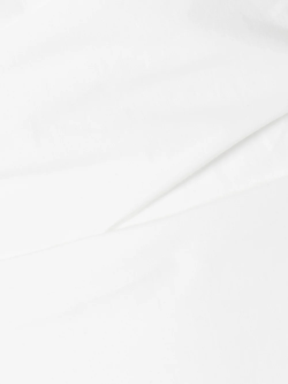 Close-up detail of the Magda Butrym Off-the-shoulder Draped Cotton-poplin Mini Dress
