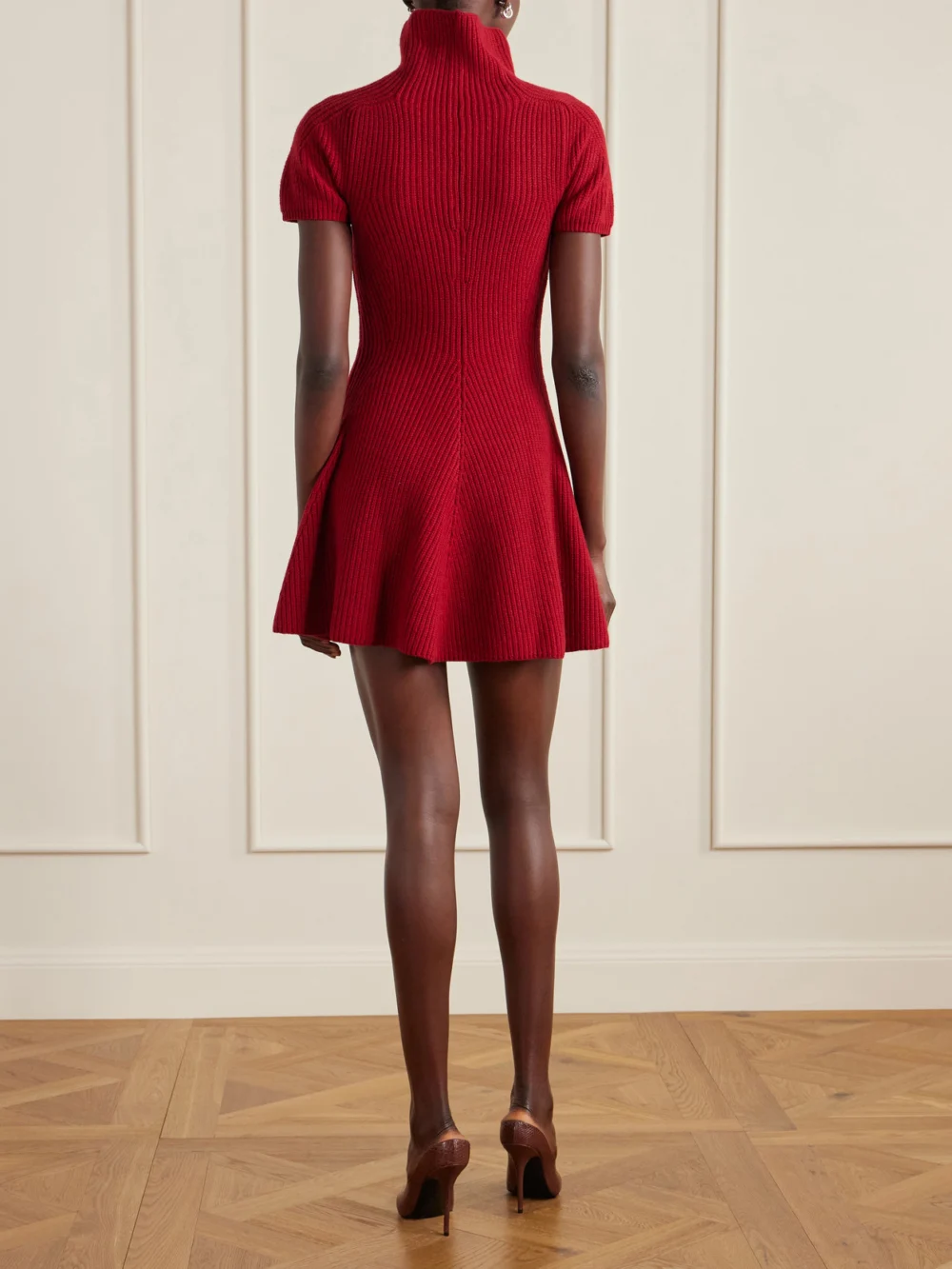 Back view of the Magda Butrym Ribbed Cashmere Turtleneck Mini Dress