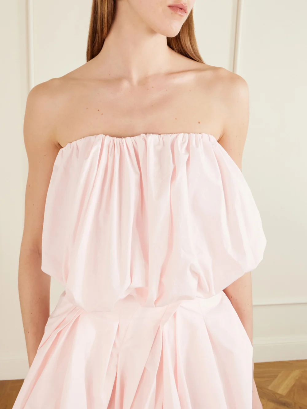 Close-up detail of the Magda Butrym Tiered Gathered Cotton-poplin Mini Dress