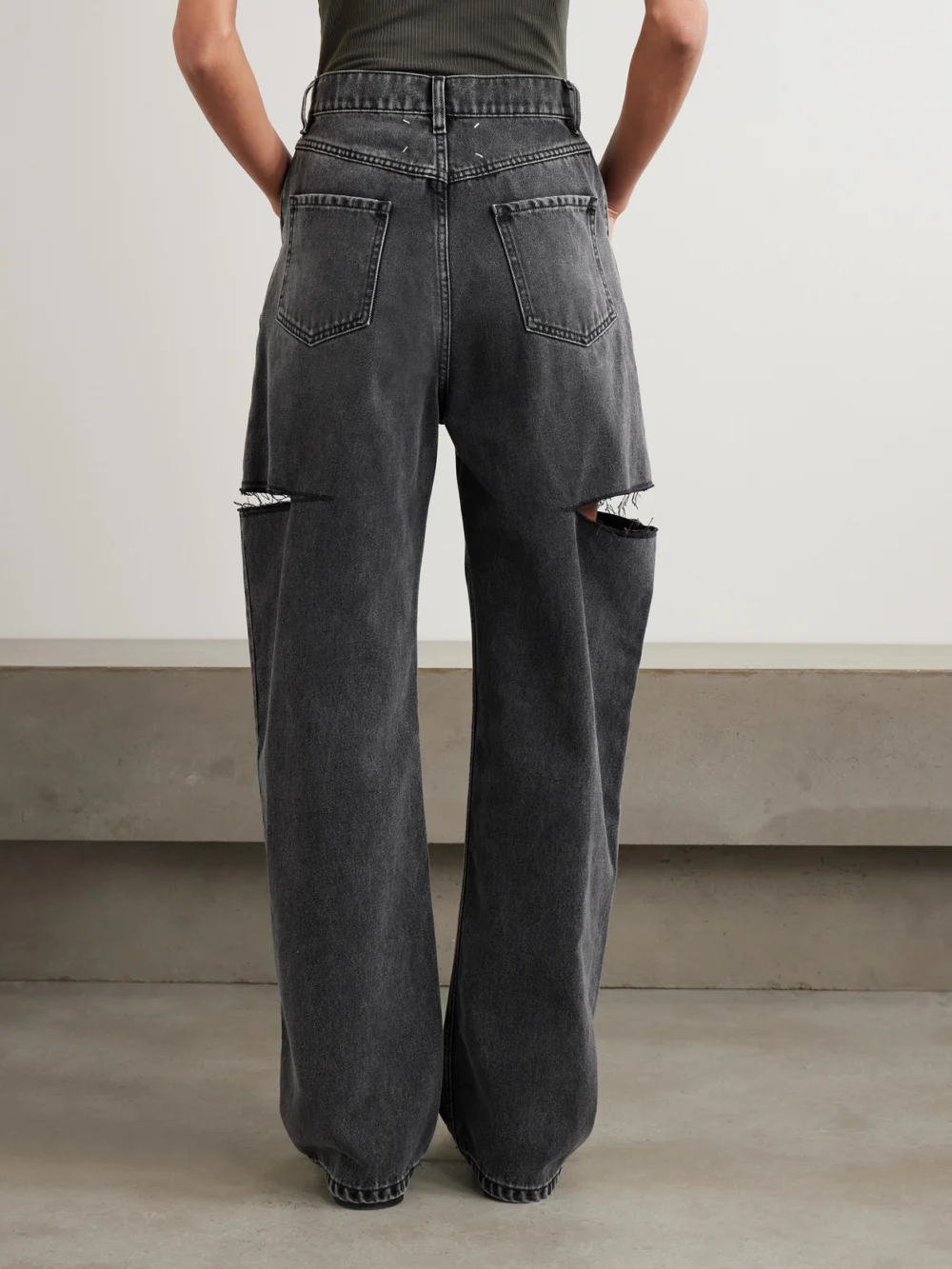 Back view of the Maison Margiela Cutout High-rise Wide-leg Jeans