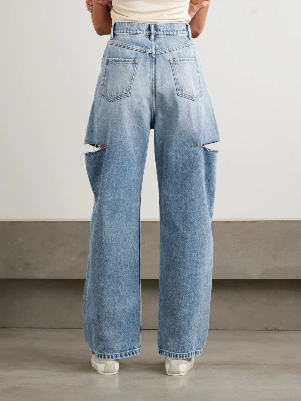 Back view of the Maison Margiela Cutout High-rise Wide-leg Jeans