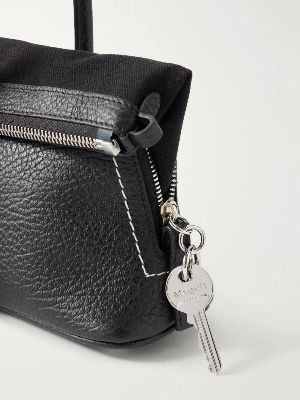 Close-up detail of the Maison Margiela East West Canvas-trimmed Leather Shoulder Bag