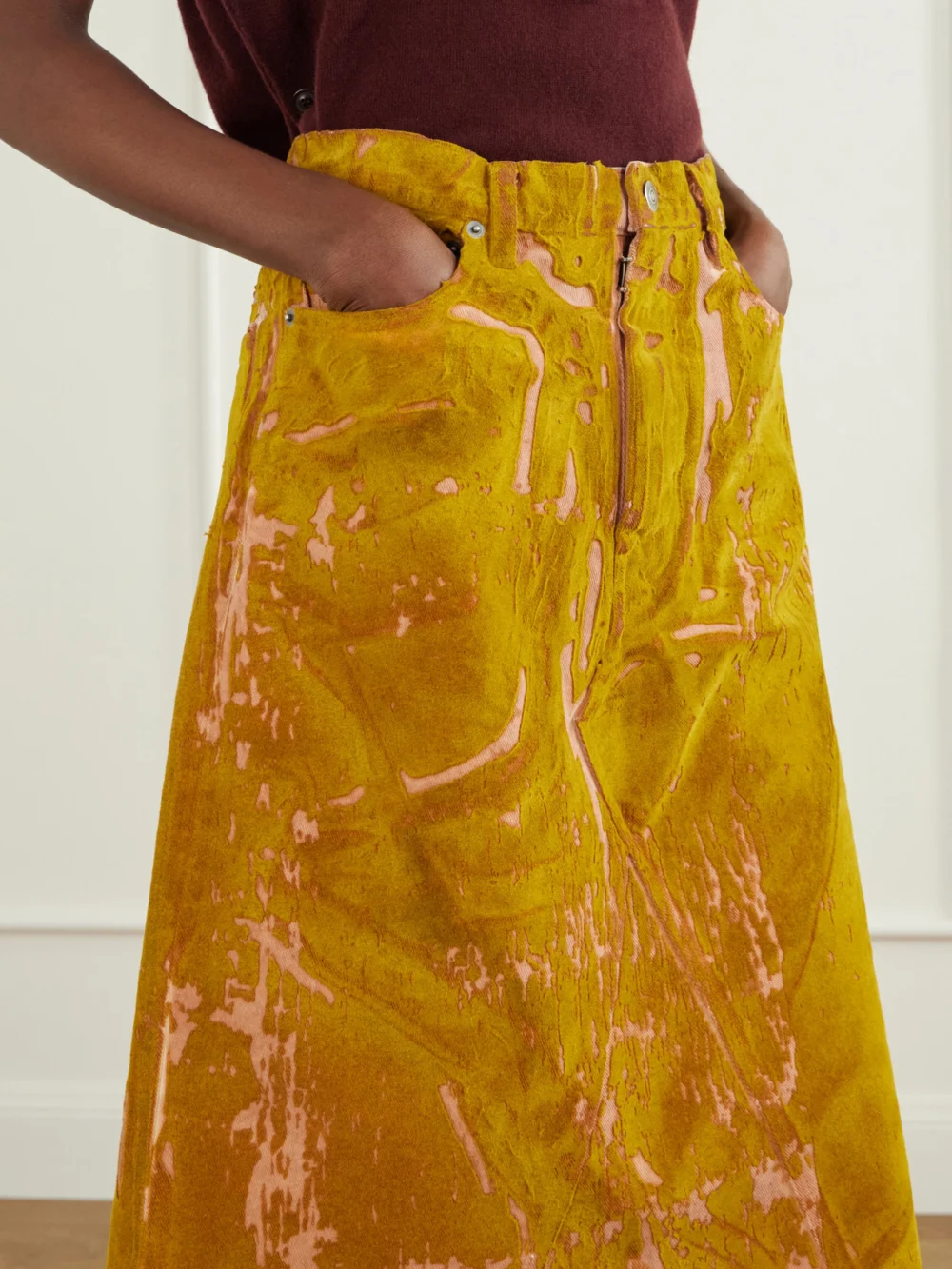 Close-up detail of the Maison Margiela Flocked Denim Midi Skirt
