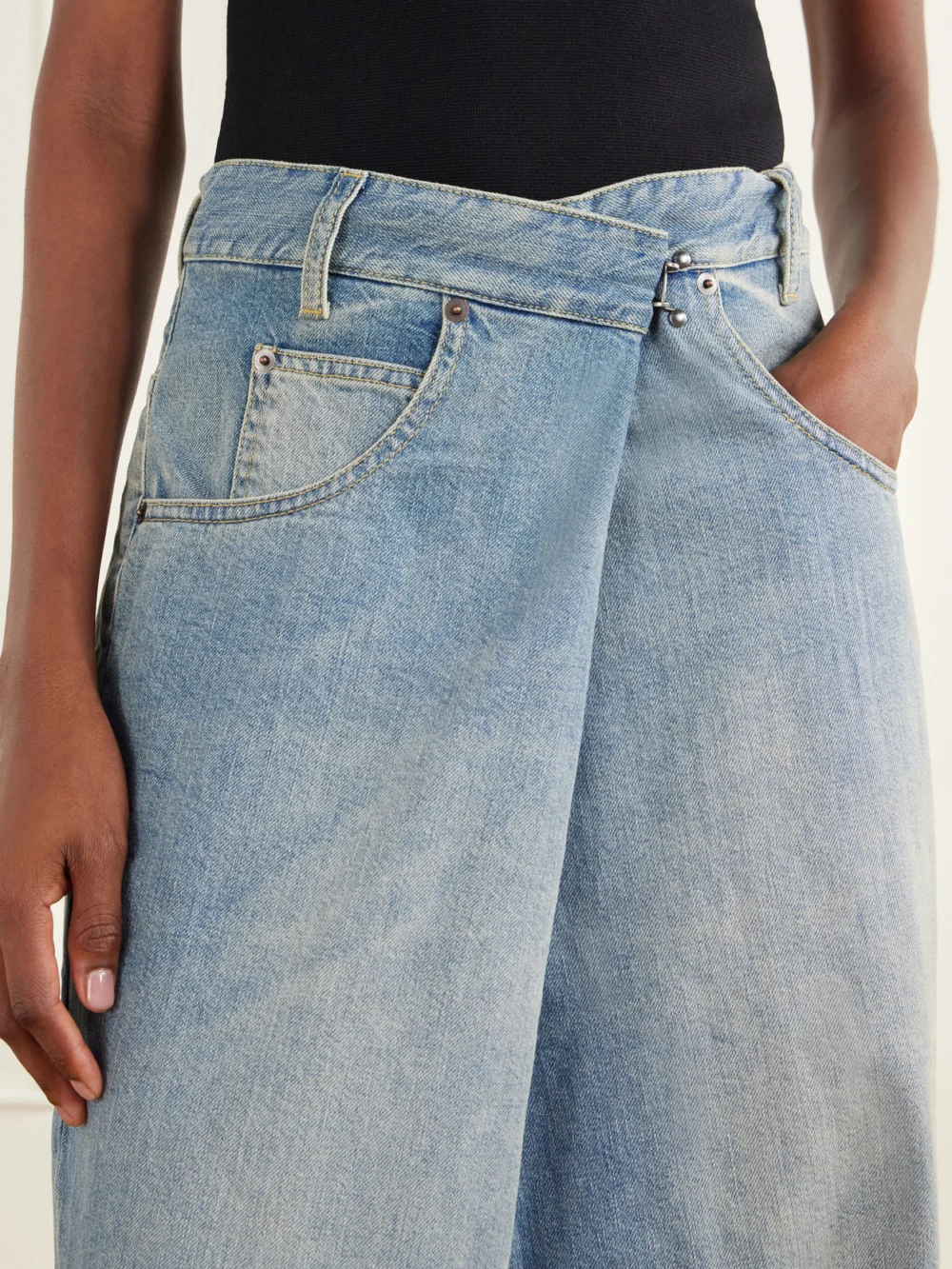 Close-up detail of the Maison Margiela High-rise Wide-leg Jeans