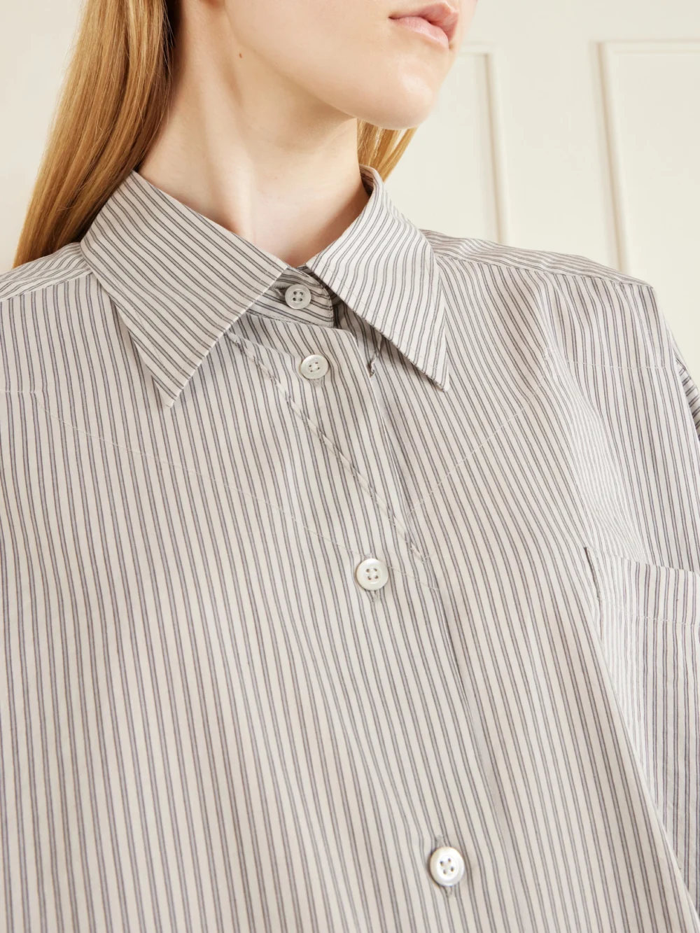 Close-up detail of the Maison Margiela Oversized Striped Cotton and Silk-blend Shirt