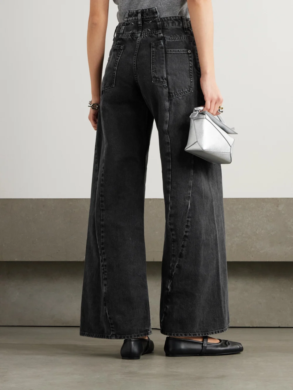 Back view of the Maison Margiela Paneled High-rise Wide-leg Jeans