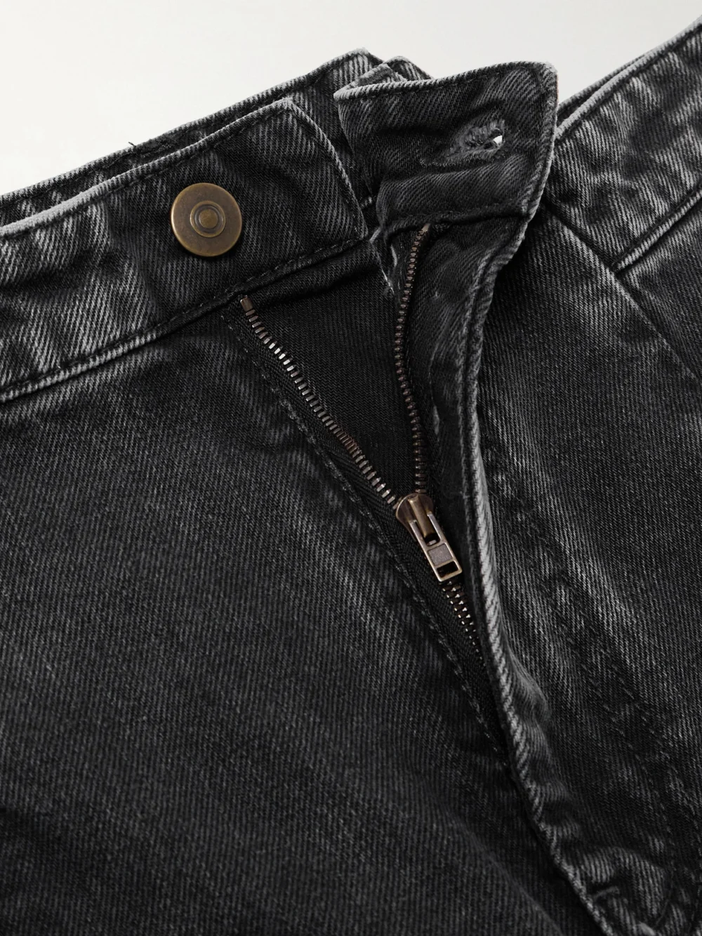 Close-up detail of the Maison Margiela Paneled High-rise Wide-leg Jeans