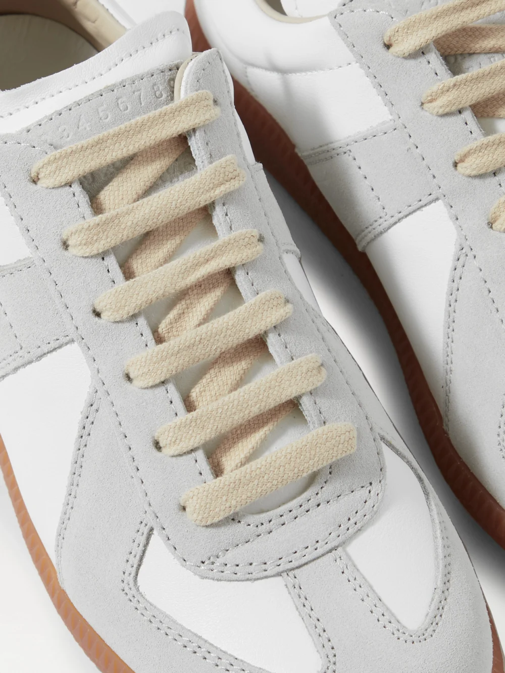 Close-up detail of the Maison Margiela Replica Leather and Suede Sneakers