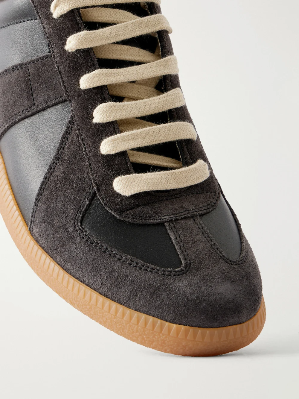 Close-up detail of the Maison Margiela Replica Suede and Leather Sneakers