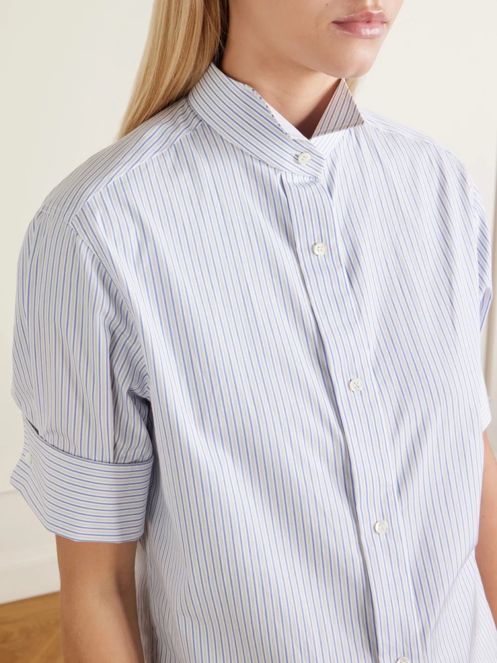 Close-up detail of the Maison Margiela Striped Cotton-poplin Shirt