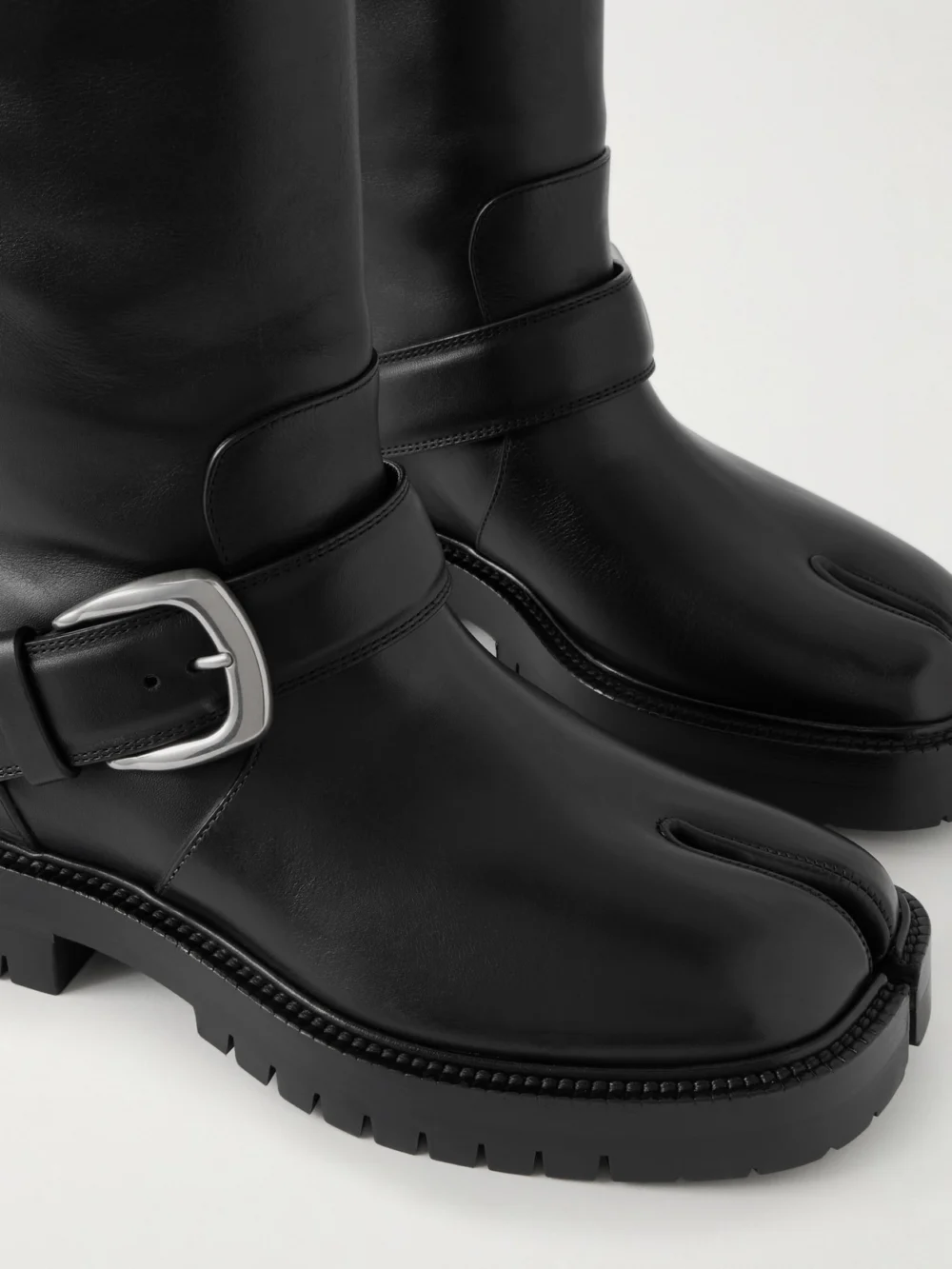 Close-up detail of the Maison Margiela Tabi Buckled Split-toe Leather Knee Boots
