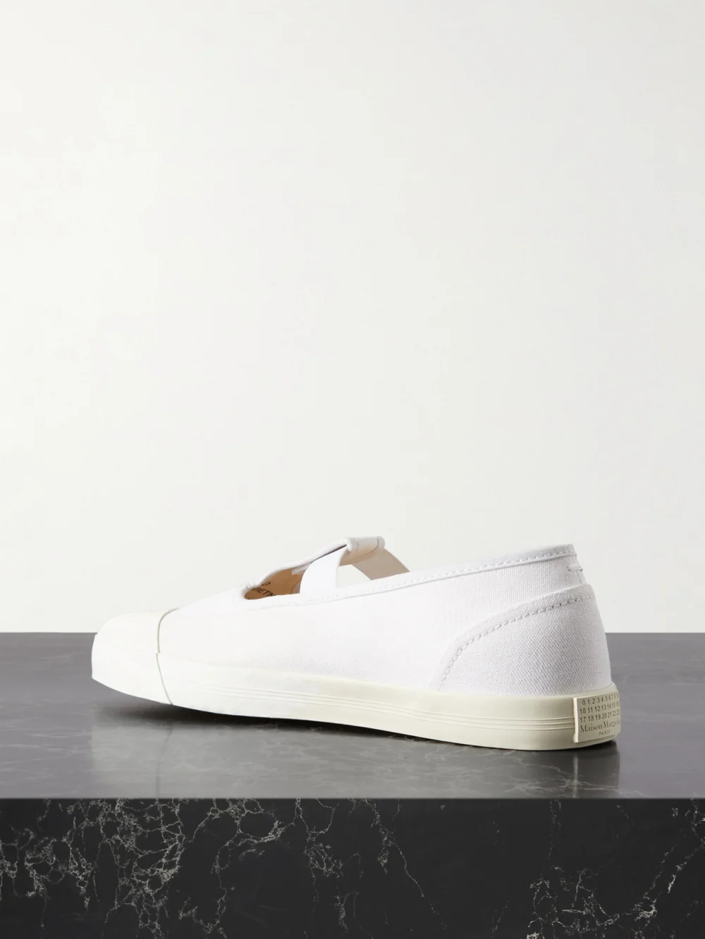 Back view of the Maison Margiela Tabi on the Deck Distressed Canvas Sneakers