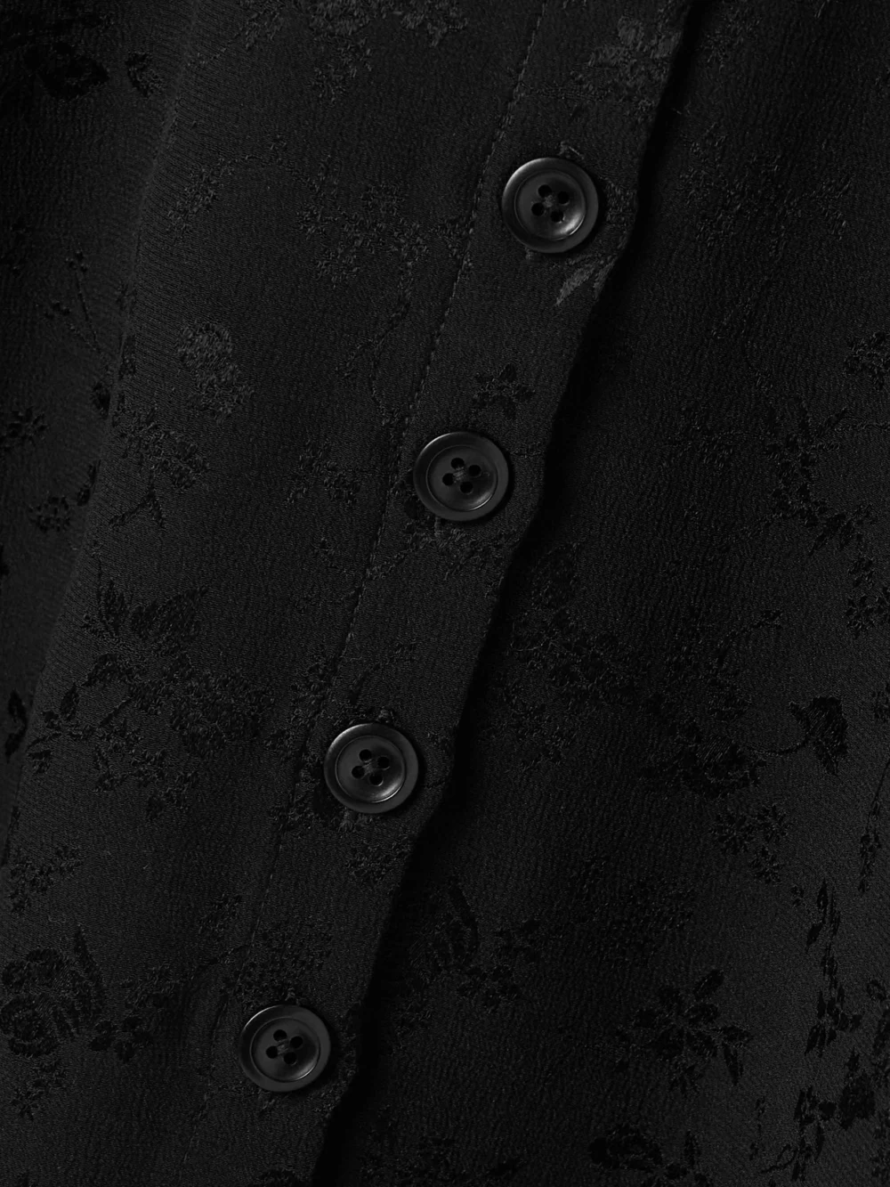 Close-up detail of the Maison Mayle Carlyne Silk-jacquard Midi Skirt