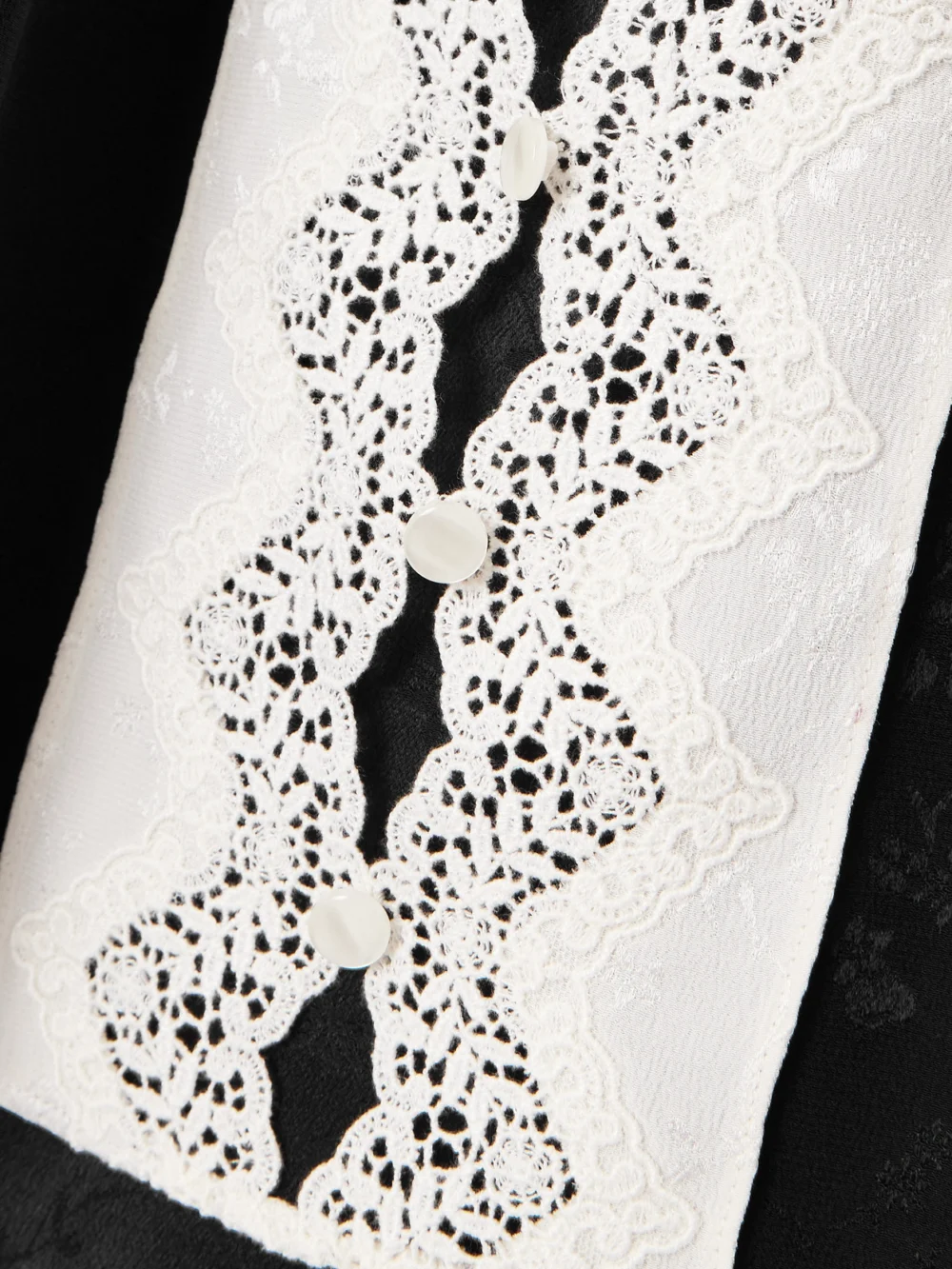 Close-up detail of the Maison Mayle Colette Ruched Lace-trimmed Silk-jacquard Camisole