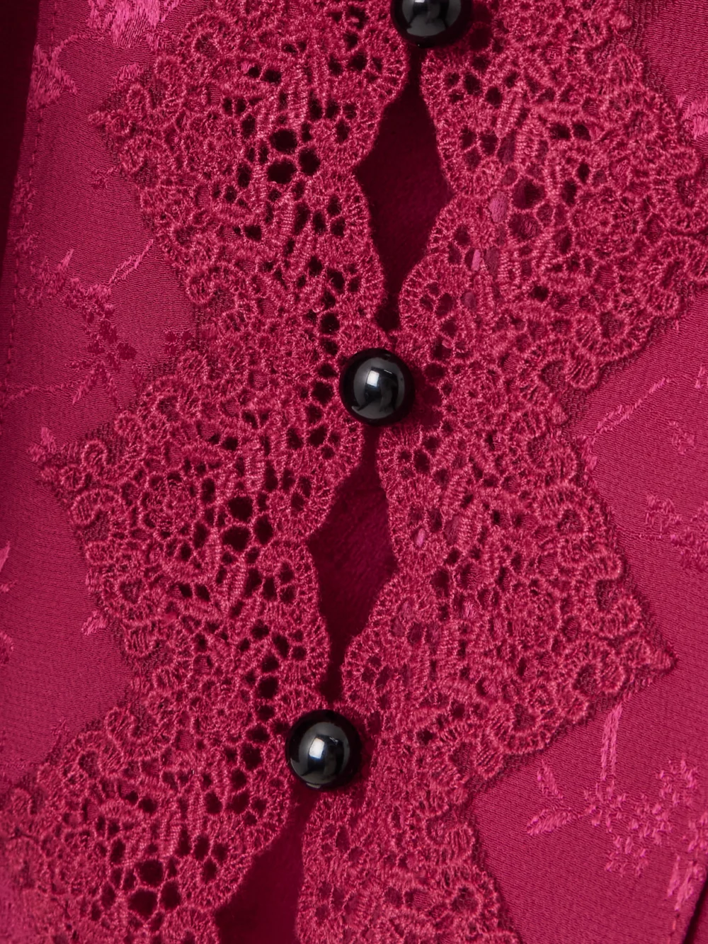 Close-up detail of the Maison Mayle Colette Ruffled Lace-trimmed Silk-jacquard Camisole
