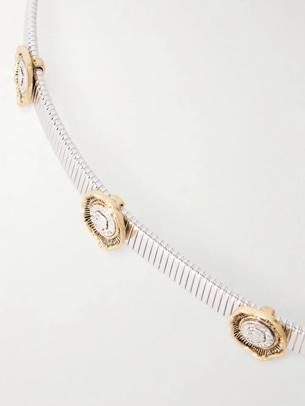 Close-up detail of the Maison Mayle Flora Embellished Silver-tone Belt