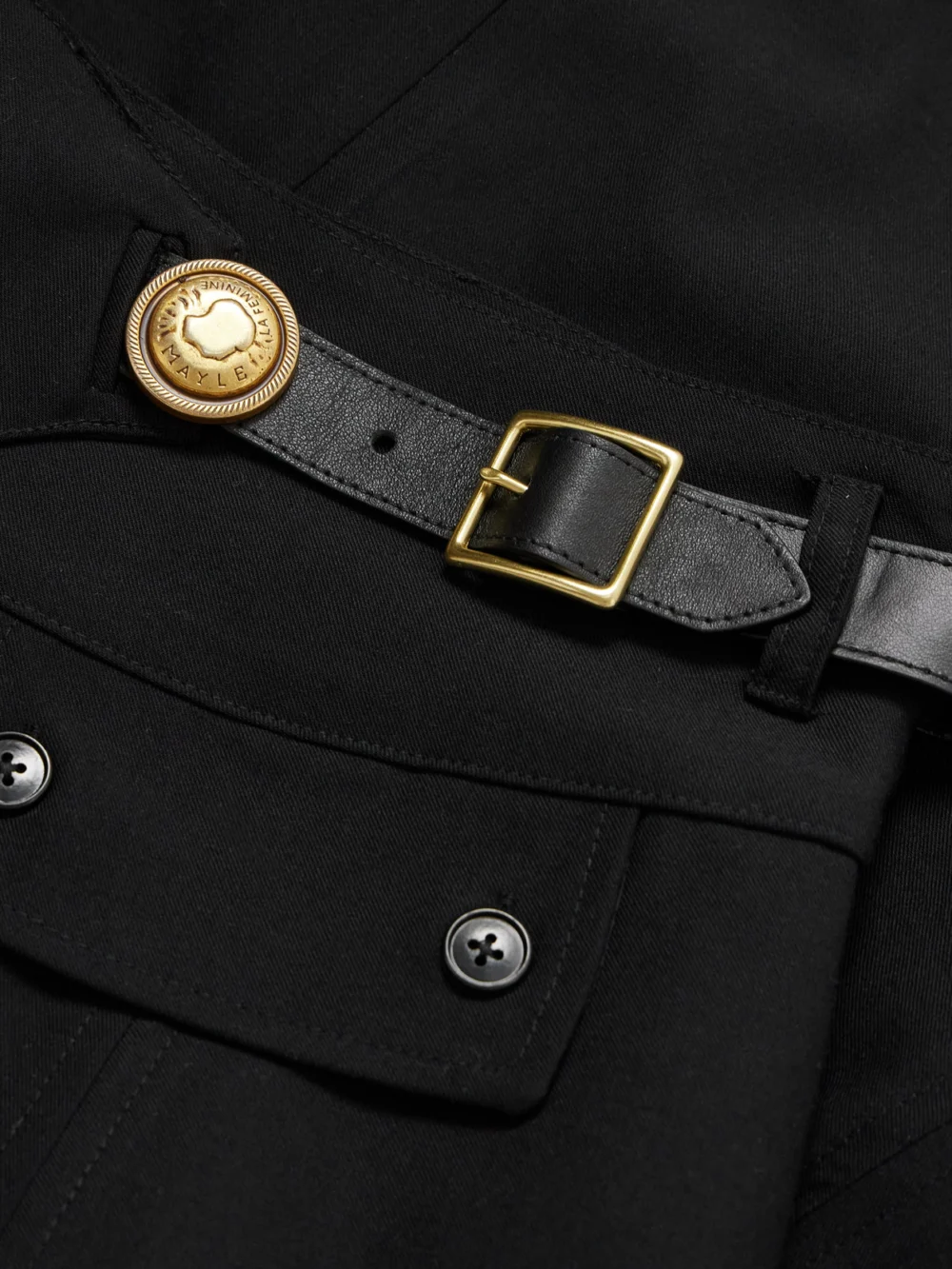 Close-up detail of the Maison Mayle Kit Embellished Leather-trimmed Woven Midi Skirt