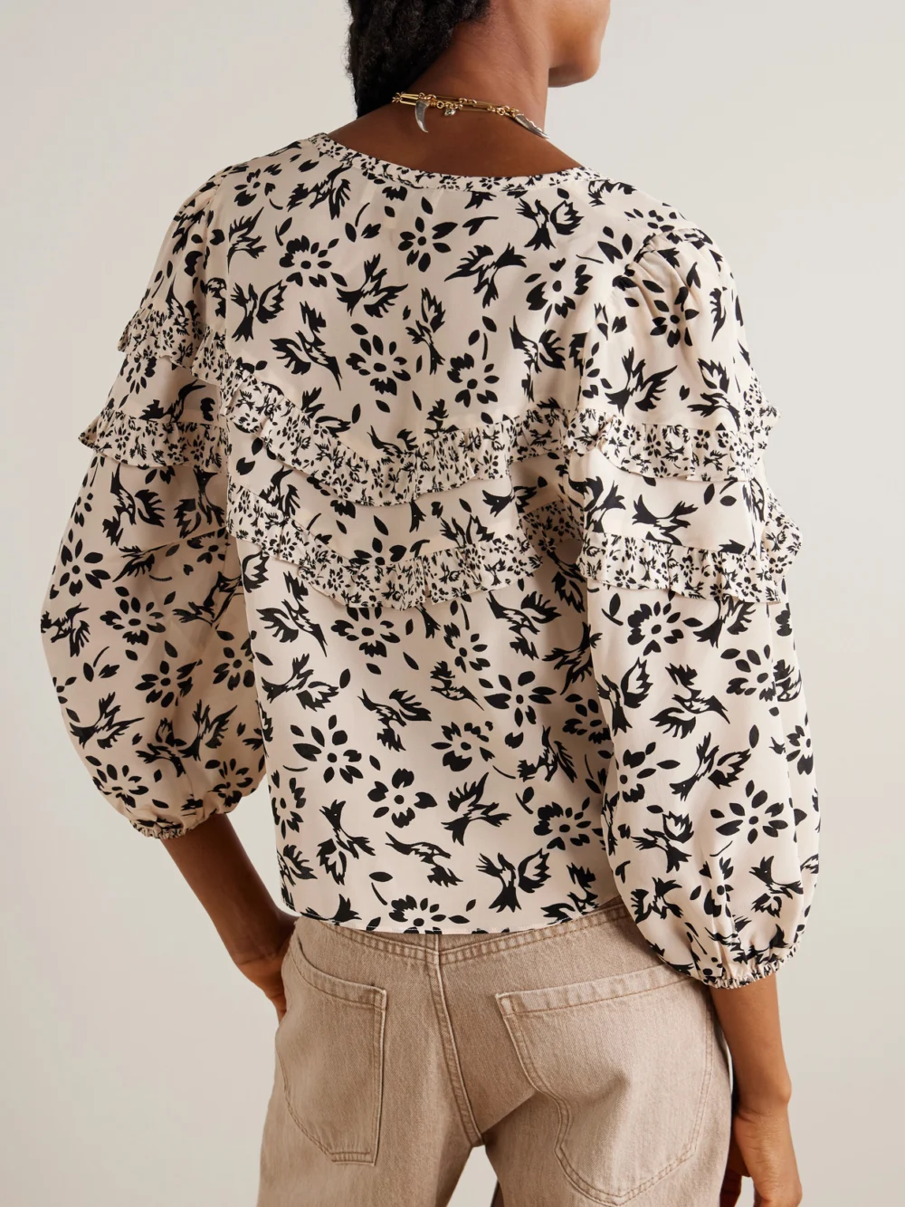 Back view of the Maison Mayle Majorelle Tie-detailed Ruffled Floral-print Silk Crepe De Chine Blouse