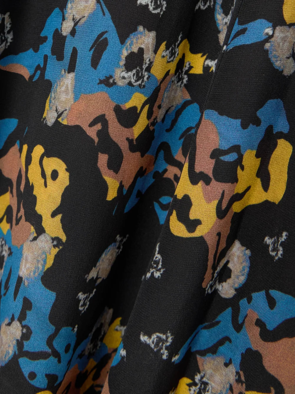 Close-up detail of the Maison Mayle Majorelle Tie-neck Ruffled Printed Silk-voile Midi Dress