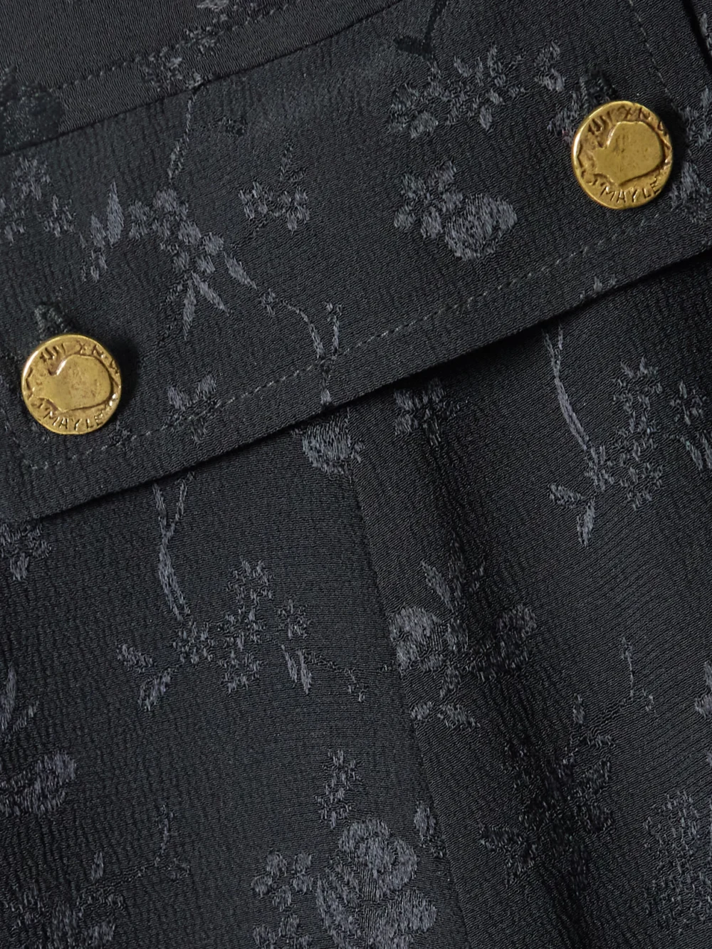 Close-up detail of the Maison Mayle Nerina Gathered Guipure Lace-trimmed Silk-jacquard Midi Dress