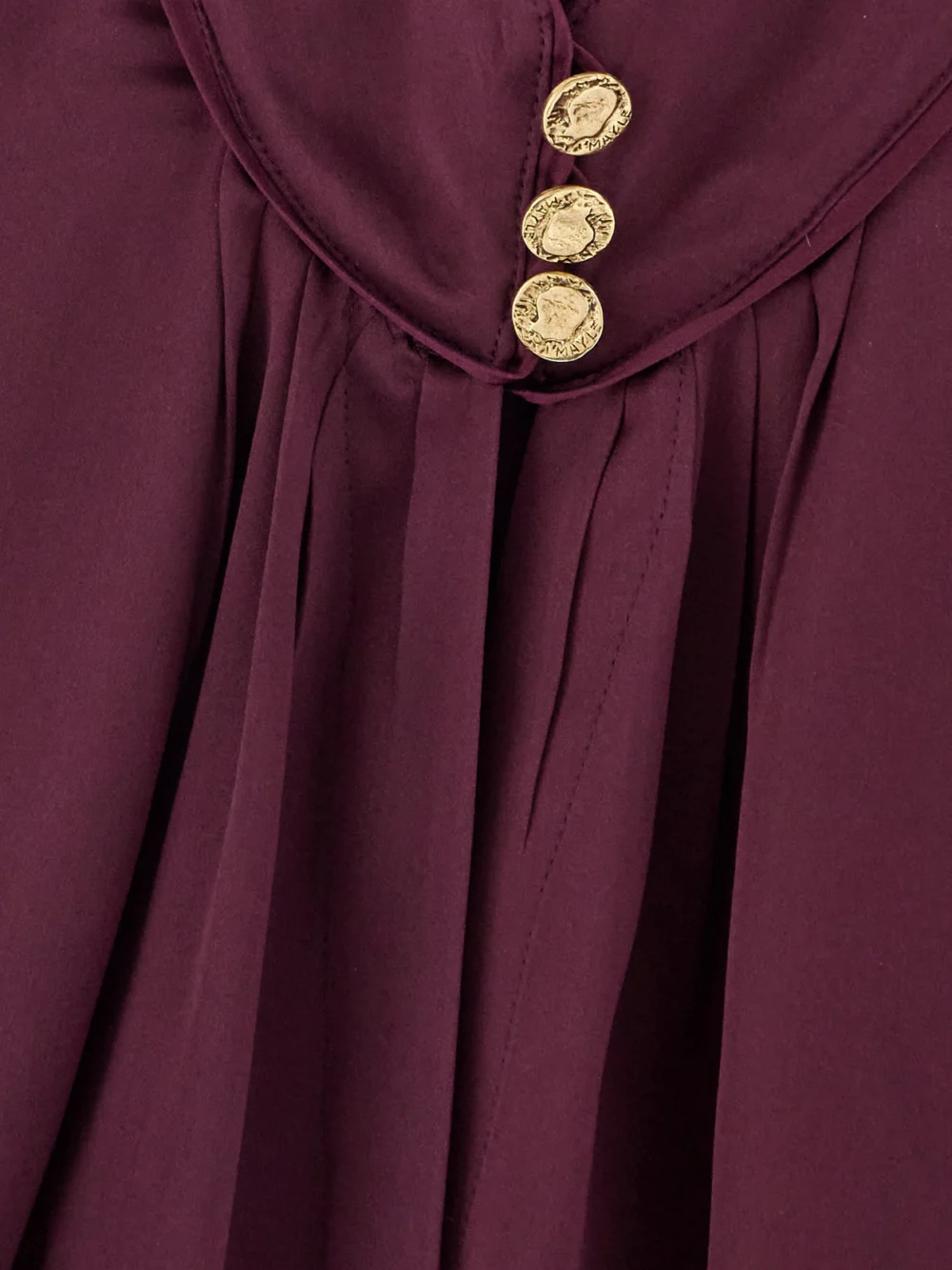 Close-up detail of the Maison Mayle Val D'isere Gathered Silk-charmeuse Blouse