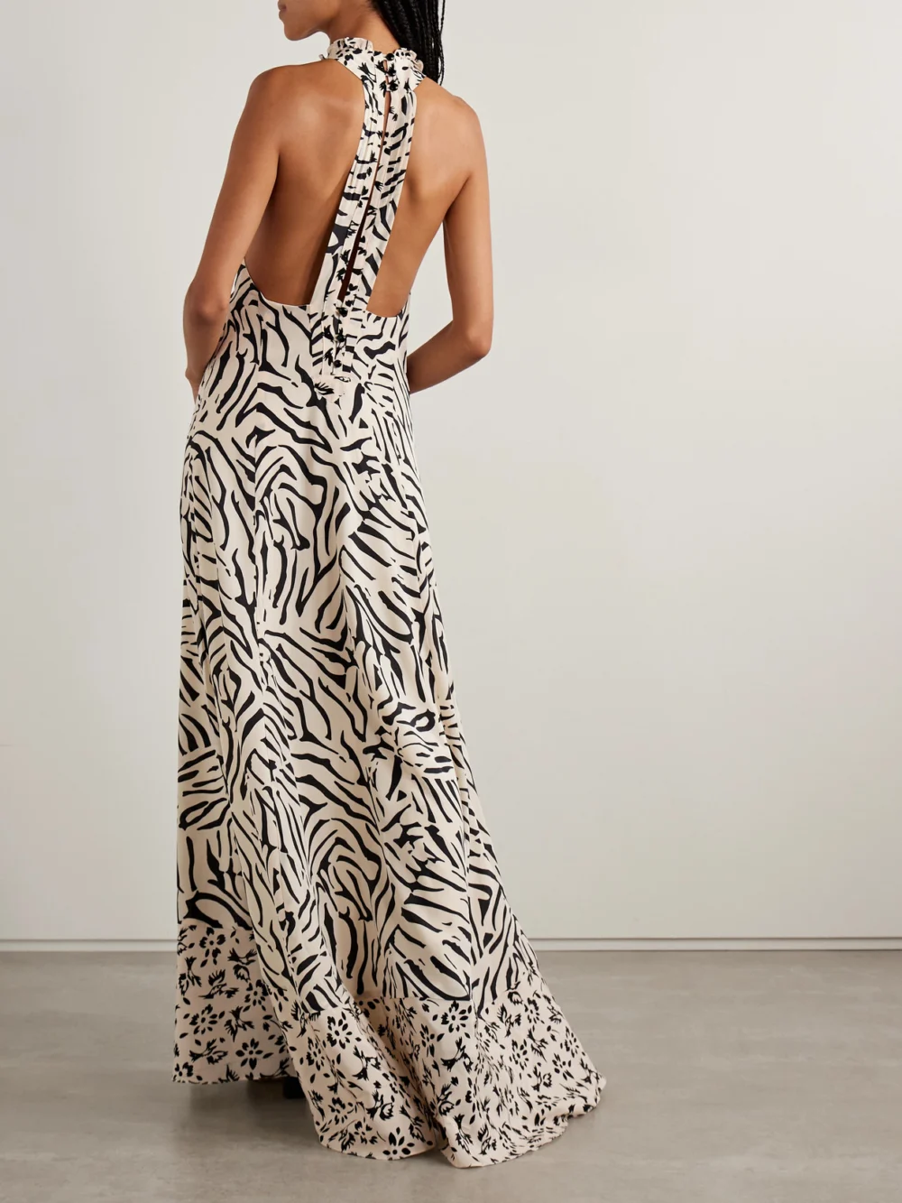 Back view of the Maison Mayle Valentine Ruffled Printed Silk-crepe Halterneck Maxi Dress
